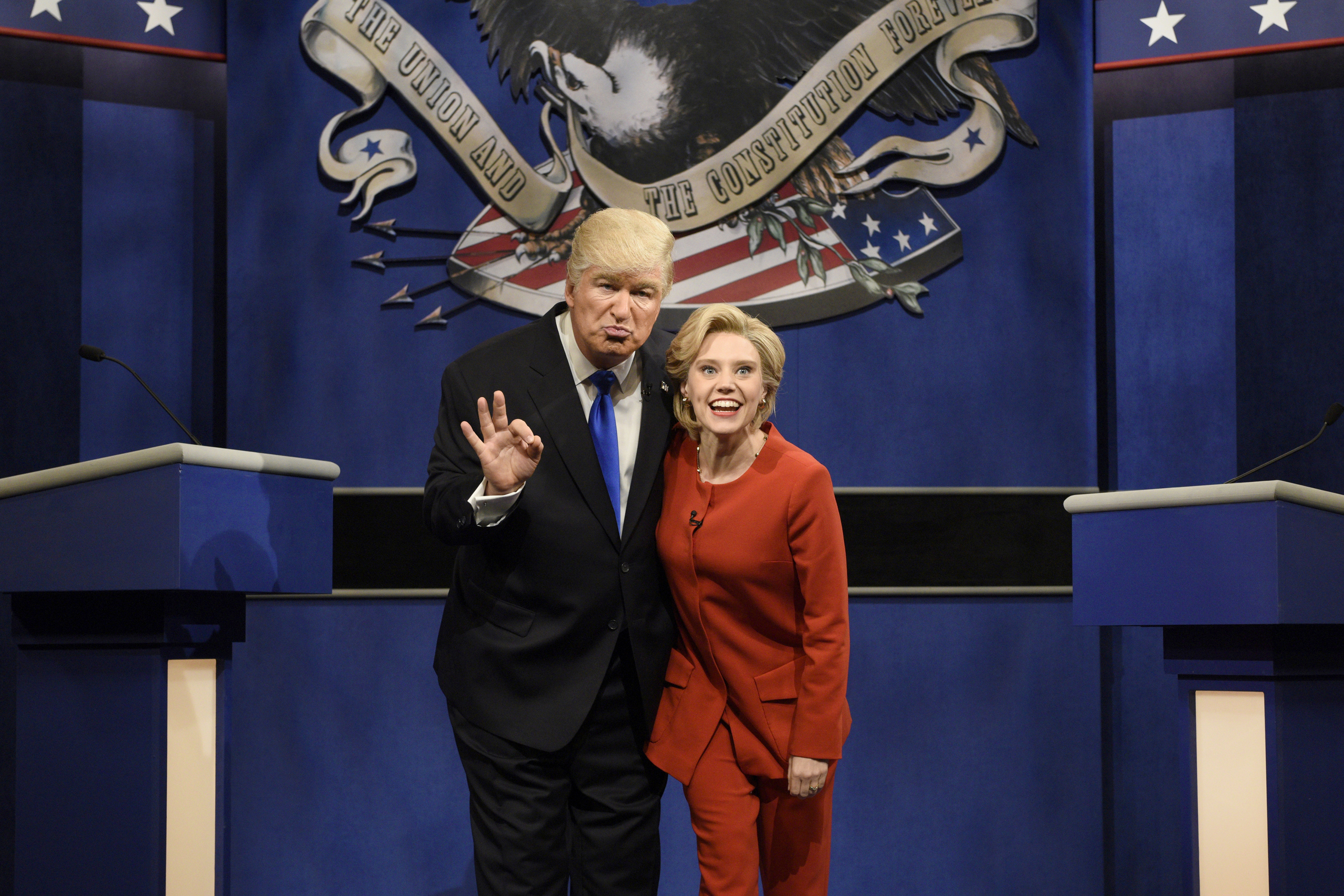 Alec Baldwin as Donald Trump and Kate McKinnon as Hillary Clinton pose for a picture during the "Debate Cold Open" sketch on Saturday Night Live on Oct. 1, 2016.