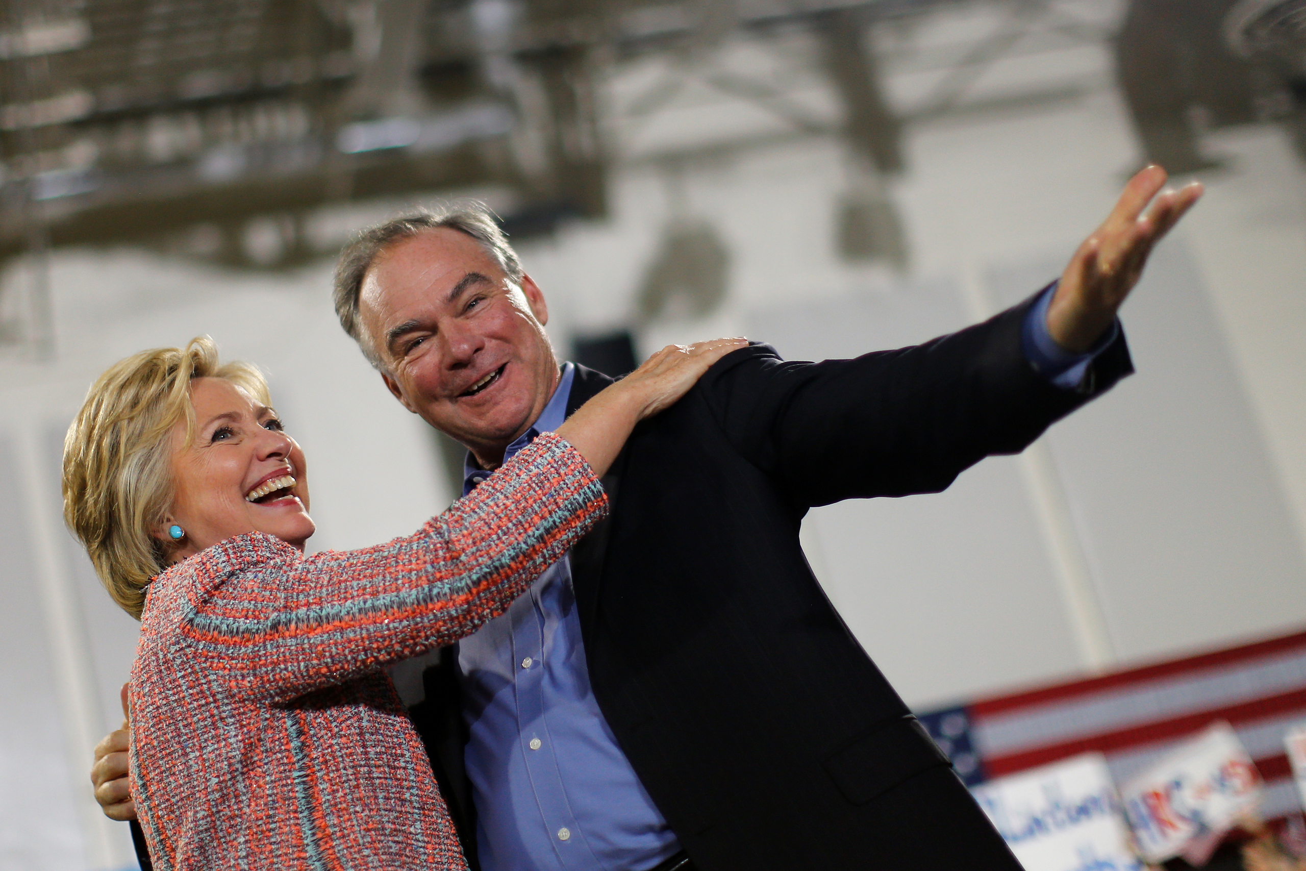 Democratic U.S. presidential candidate Hillary Clinton and U.S. Senator Tim Kaine react during a campaign rally at Ernst Community Cultural Center in Annandale, Virginia on July 14, 2016. Democratic U.S. presidential candidate Hillary Clinton and U.S. Se