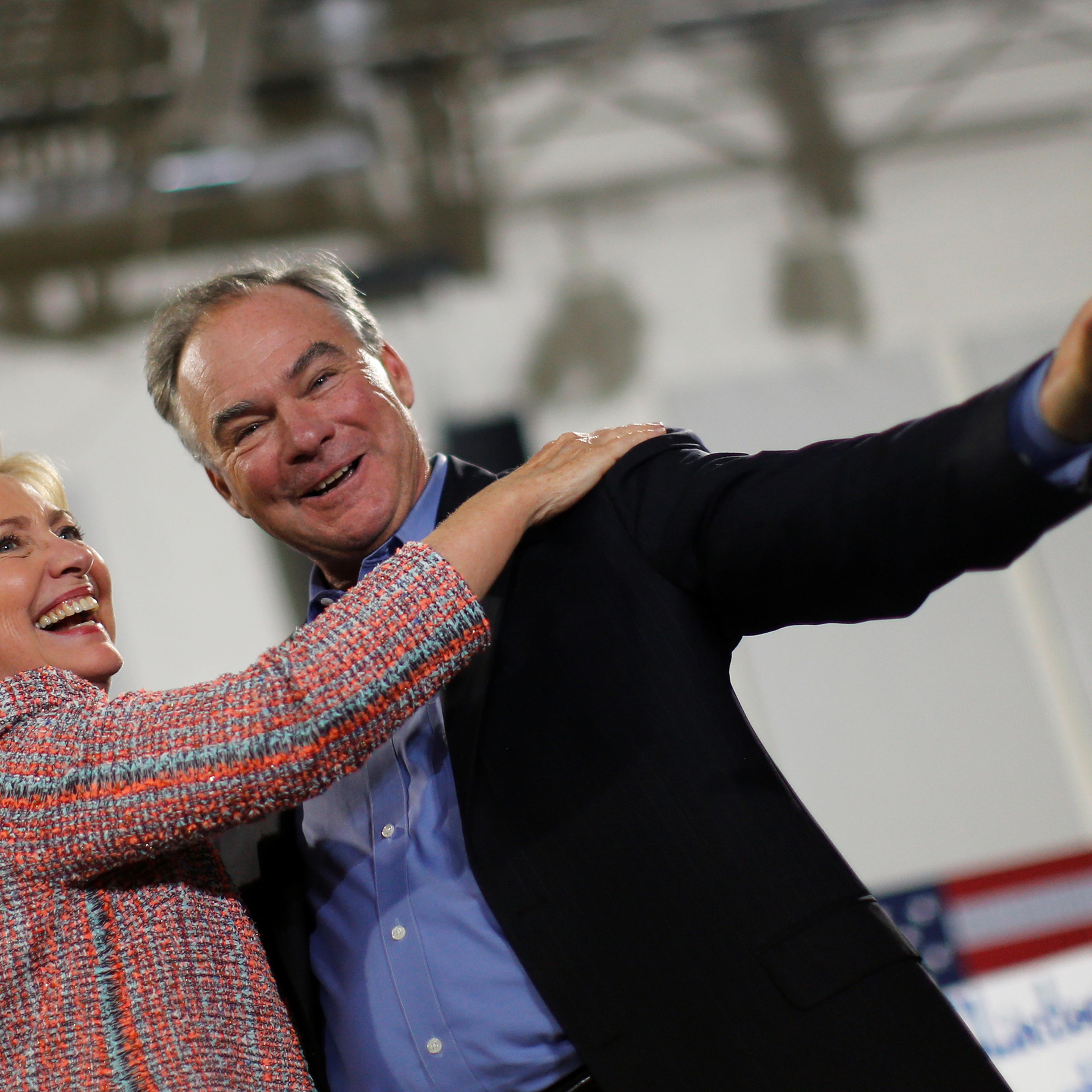 Democratic U.S. presidential candidate Hillary Clinton and U.S. Senator Tim Kaine react during a campaign rally at Ernst Community Cultural Center in Annandale, Virginia on July 14, 2016. Democratic U.S. presidential candidate Hillary Clinton and U.S. Se