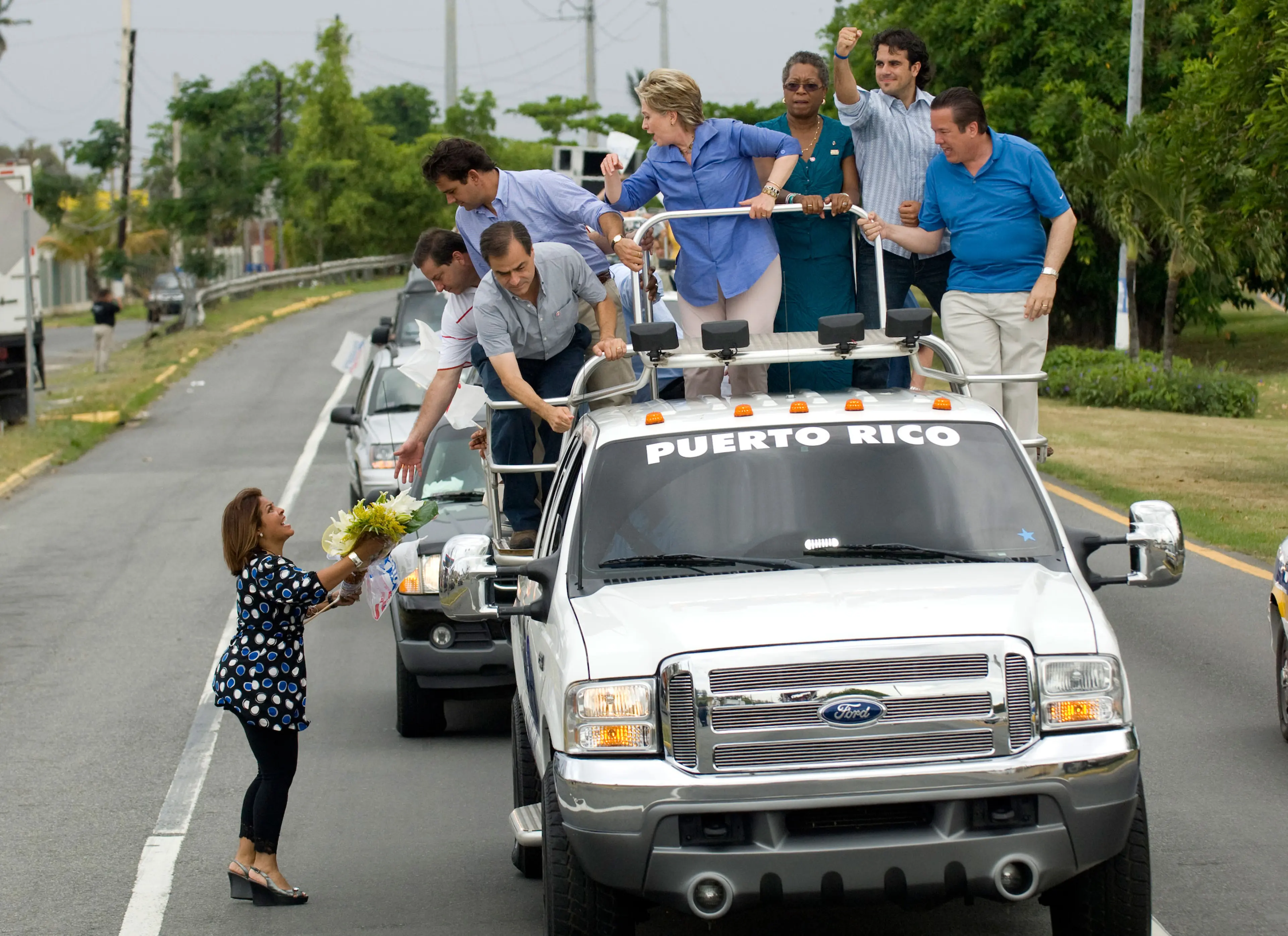 A campaign stop in Puerto Rico during the 2008 presidential elections. It's tradition that candidates ride through town on a truck with music blaring.