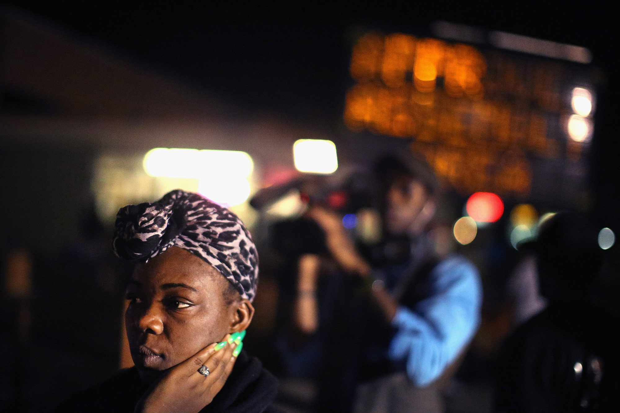 Demonstrators protest the killing of teenager Michael Brown on Aug. 20, 2014 in Ferguson, Mo.