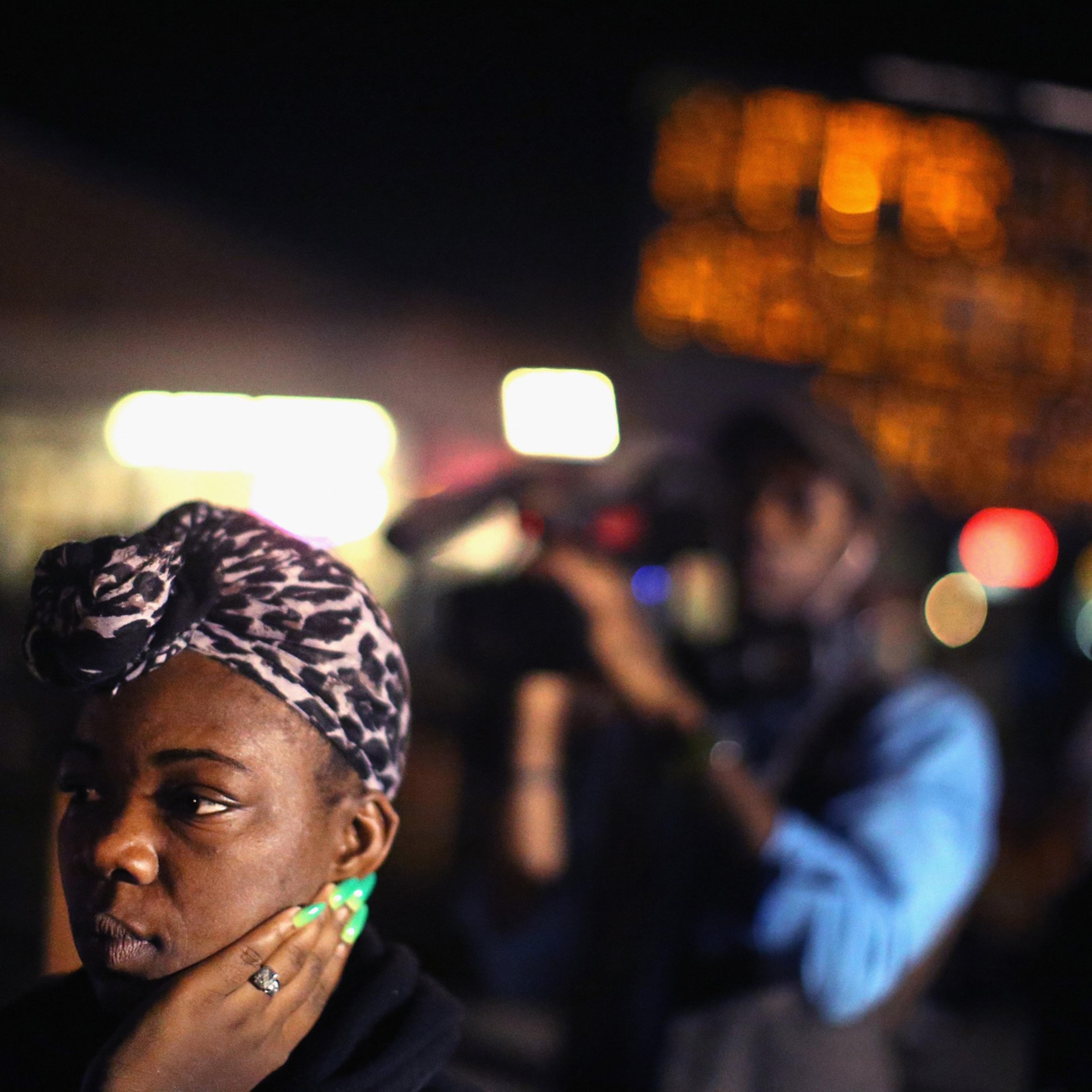 Demonstrators protest the killing of teenager Michael Brown on Aug. 20, 2014 in Ferguson, Mo.
