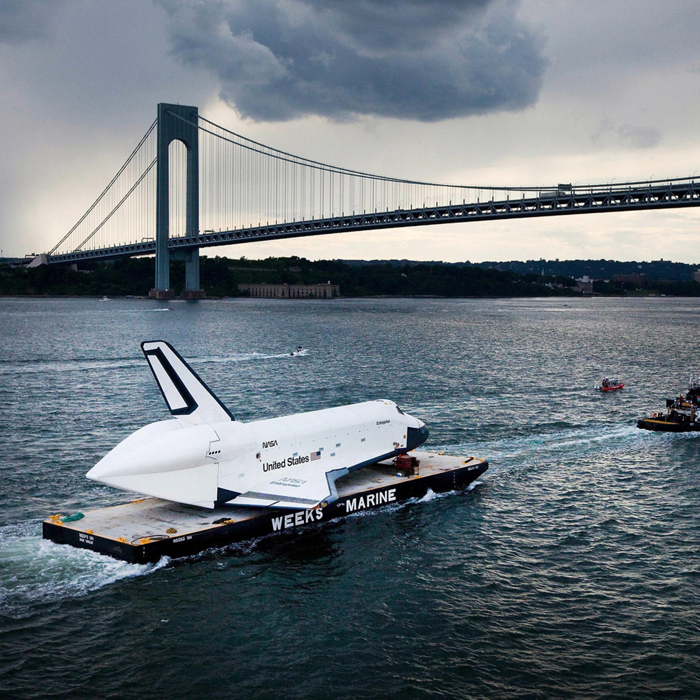 June 3, 2012. The space shuttle Enterprise is carried by barge underneath the Verrazano-Narrows Bridge in New York City. Enterprise is on its way to the Intrepid Sea, Air and Space Museum, where it will be put on permanent display.