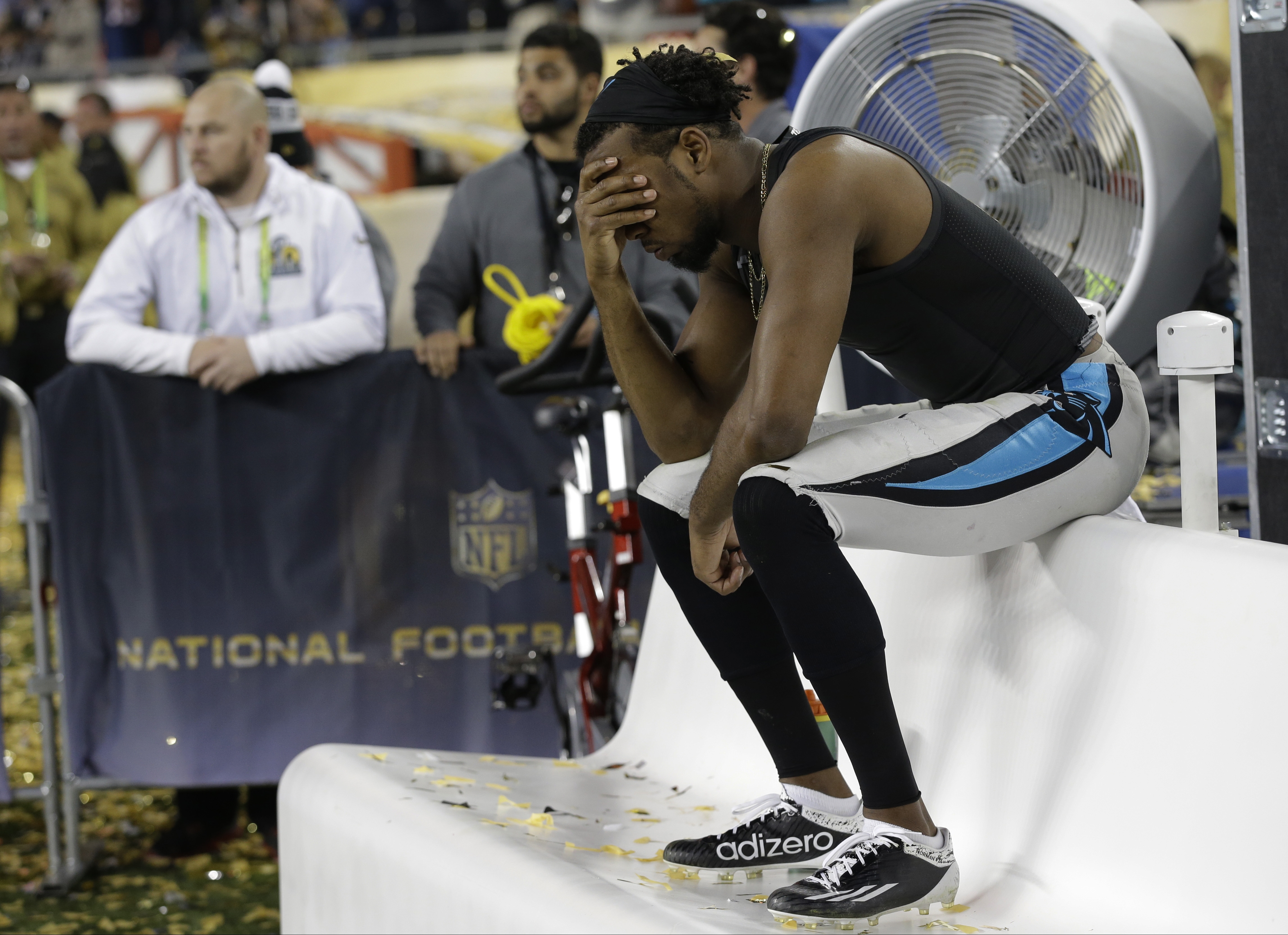 Carolina Panthers Josh Norman (24) sits on the bench after the NFL Super Bowl 50 football game against the Denver Broncos Sunday in Santa Clara, Calif., on Feb. 7, 2016.