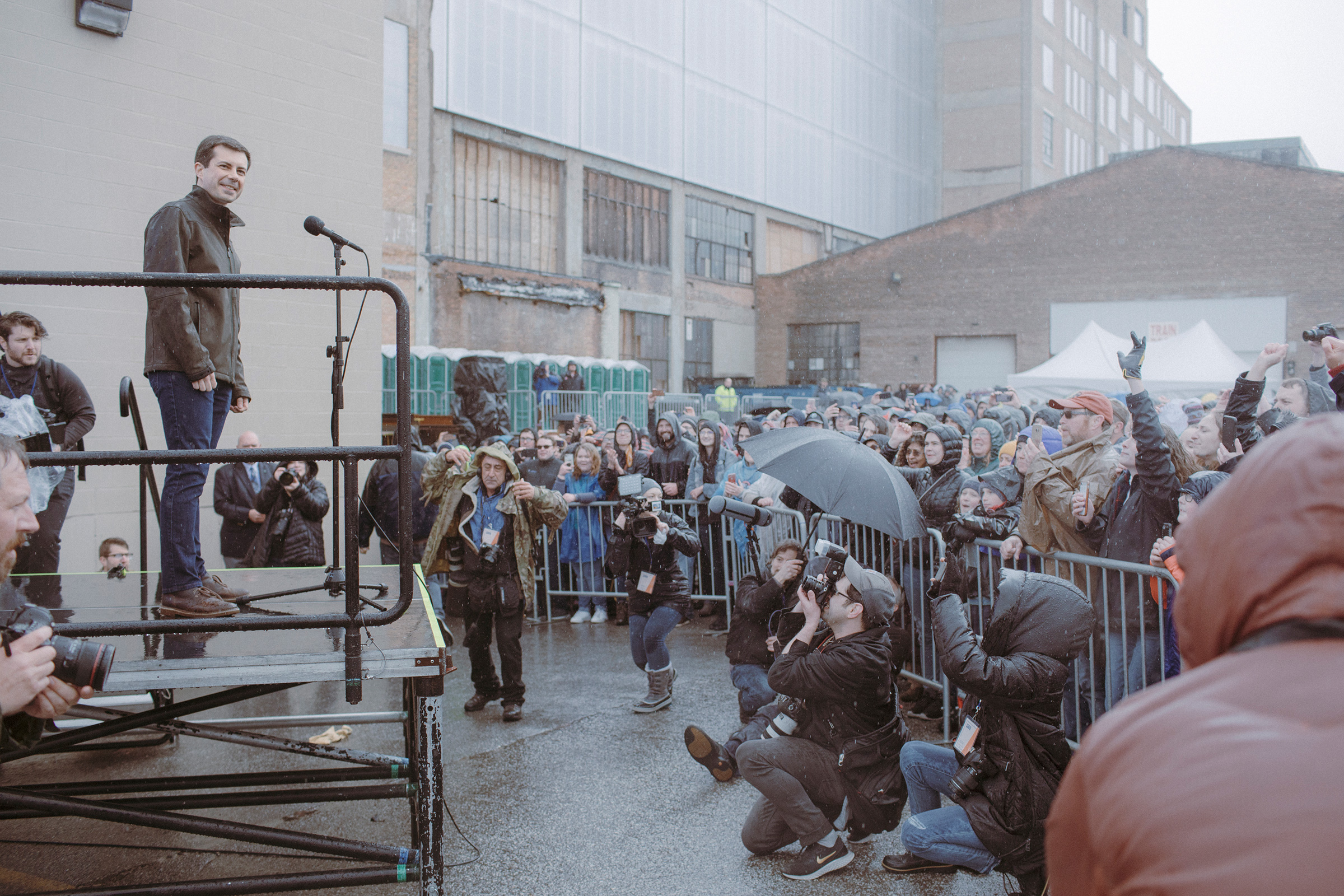 Mayor Pete Buttigieg greets the overflow crowd of supporters waiting in the rain on April 14 outside his presidential campaign announcement in South Bend.
