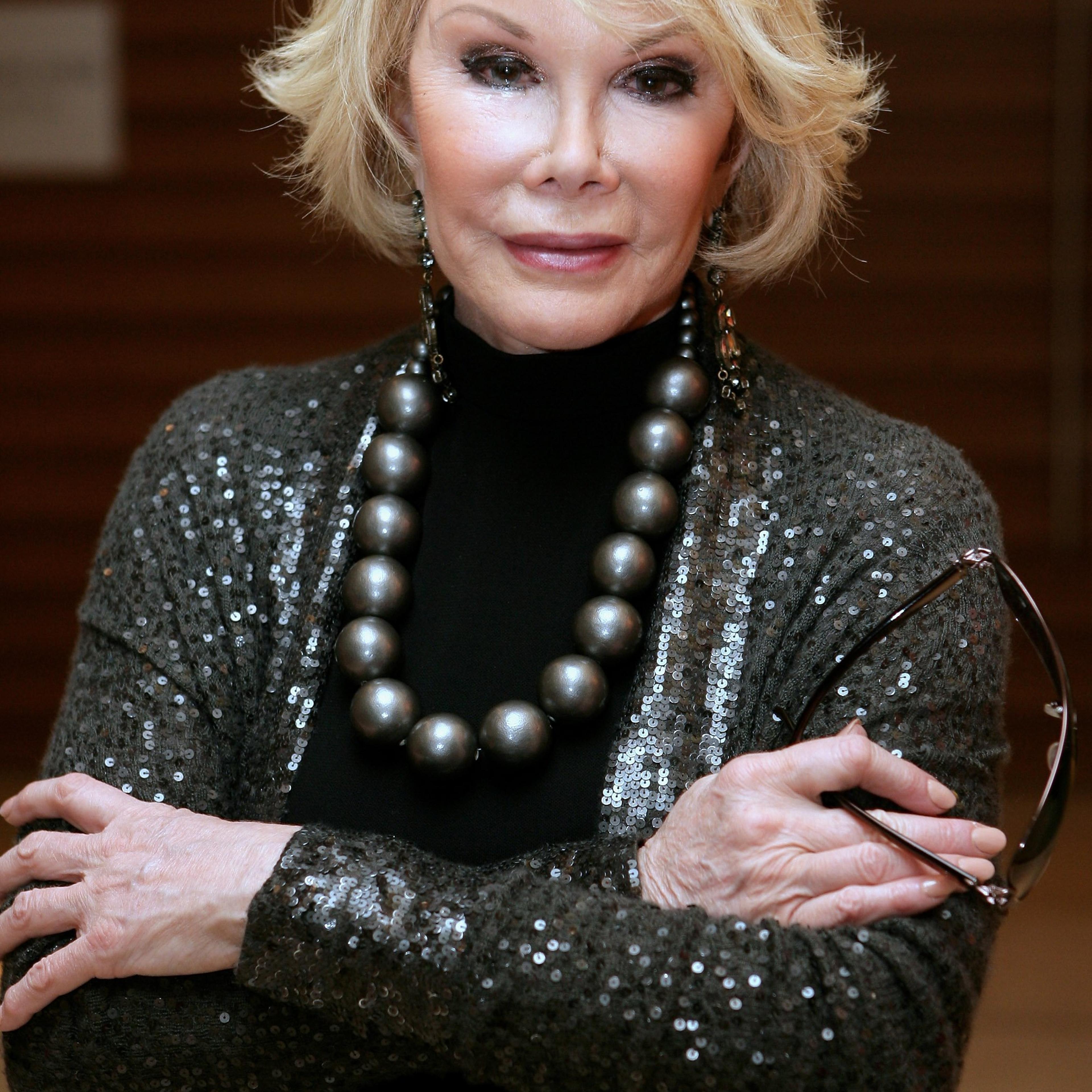 FILE Comedian Joan Rivers Hospitalised After She Stops Breathing Following An Operation On Her Vocal Chords