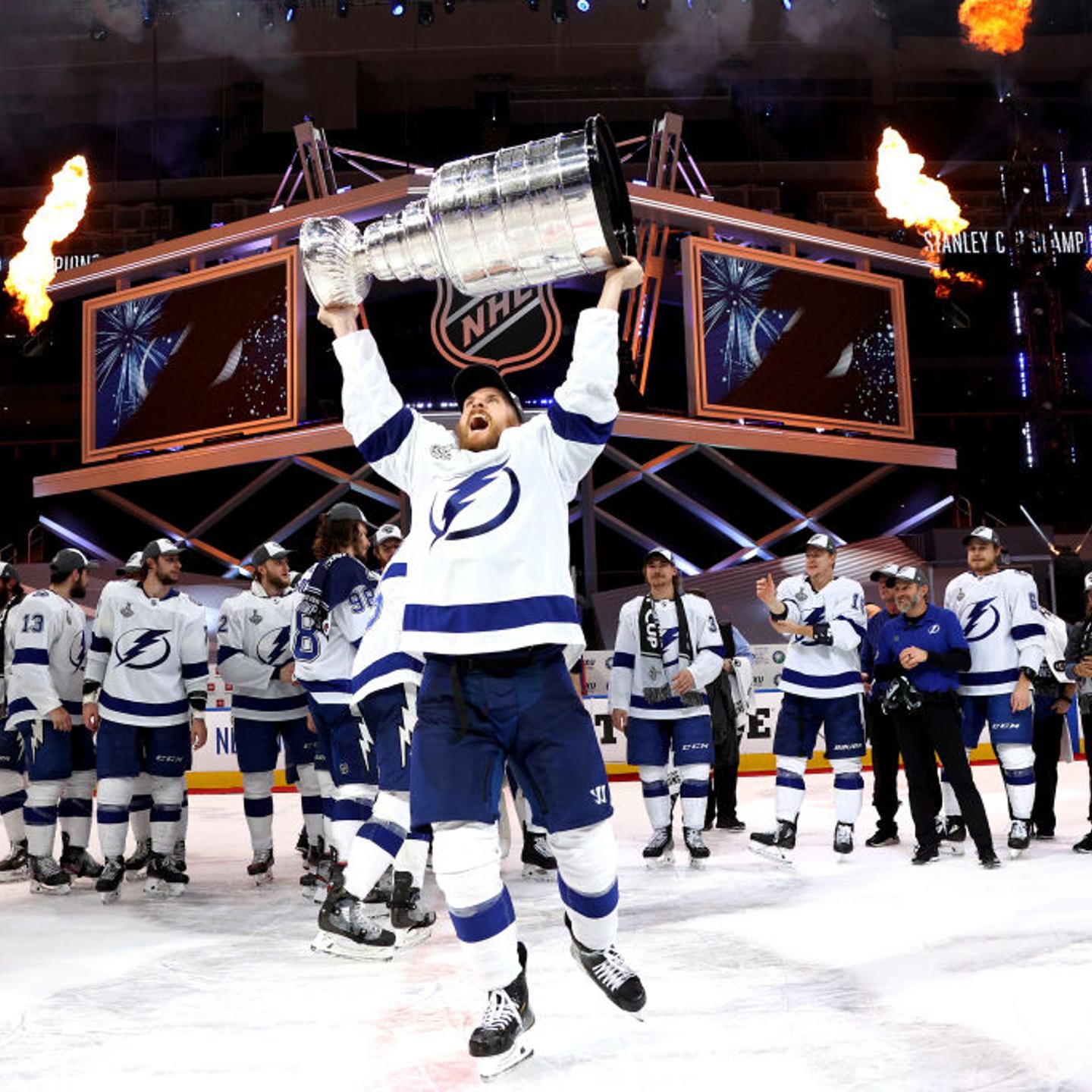 Blake Coleman #20 of the Tampa Bay Lightning hoists the Stanley Cup overhead