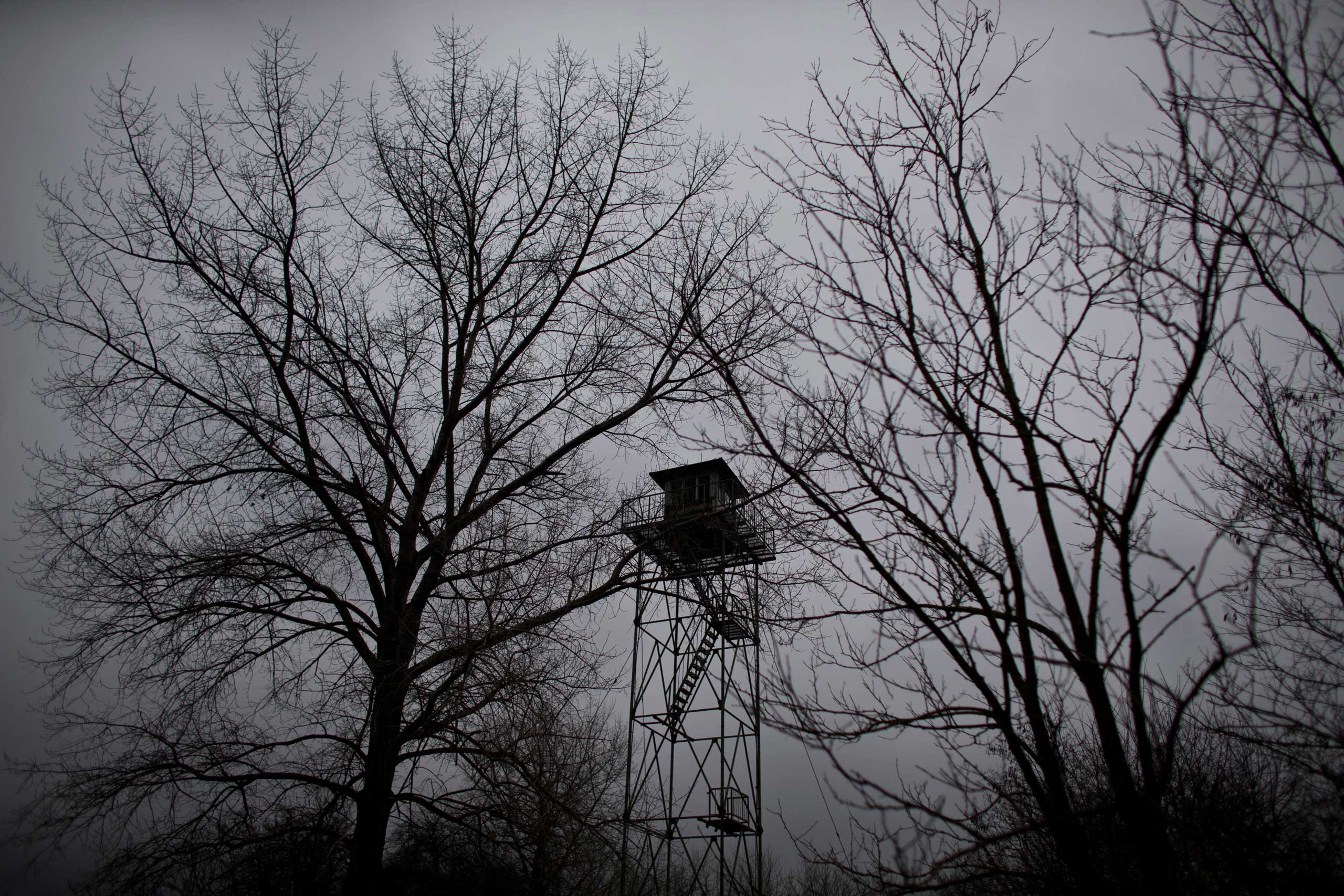 A watchtower left over from the Cold War era is seen meters away from the Serbian border with Hungary close to Kelebija, 90 miles north of Belgrade, Serbia on Feb. 26, 2015,