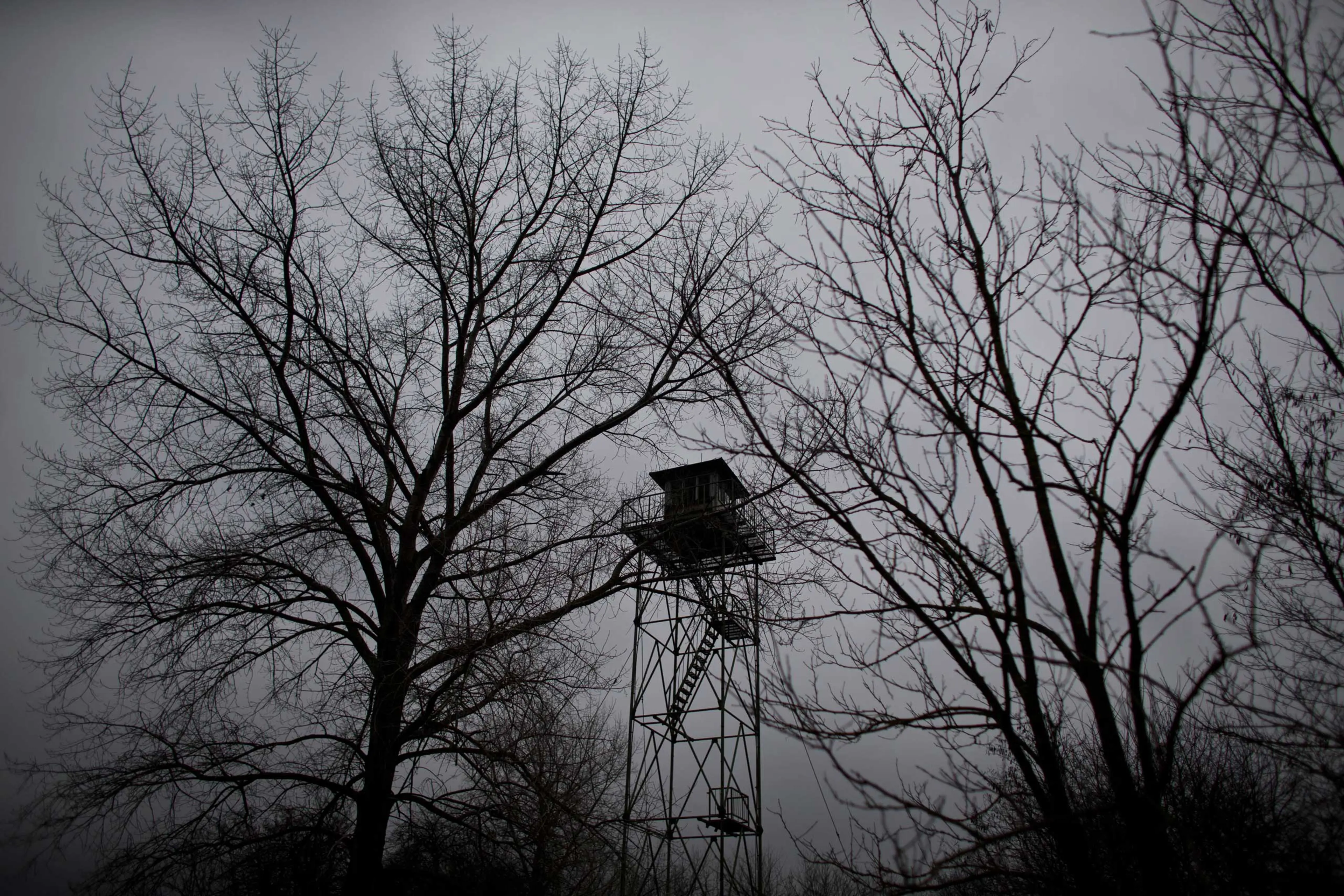 A watchtower left over from the Cold War era is seen meters away from the Serbian border with Hungary close to Kelebija, 90 miles north of Belgrade, Serbia on Feb. 26, 2015,
