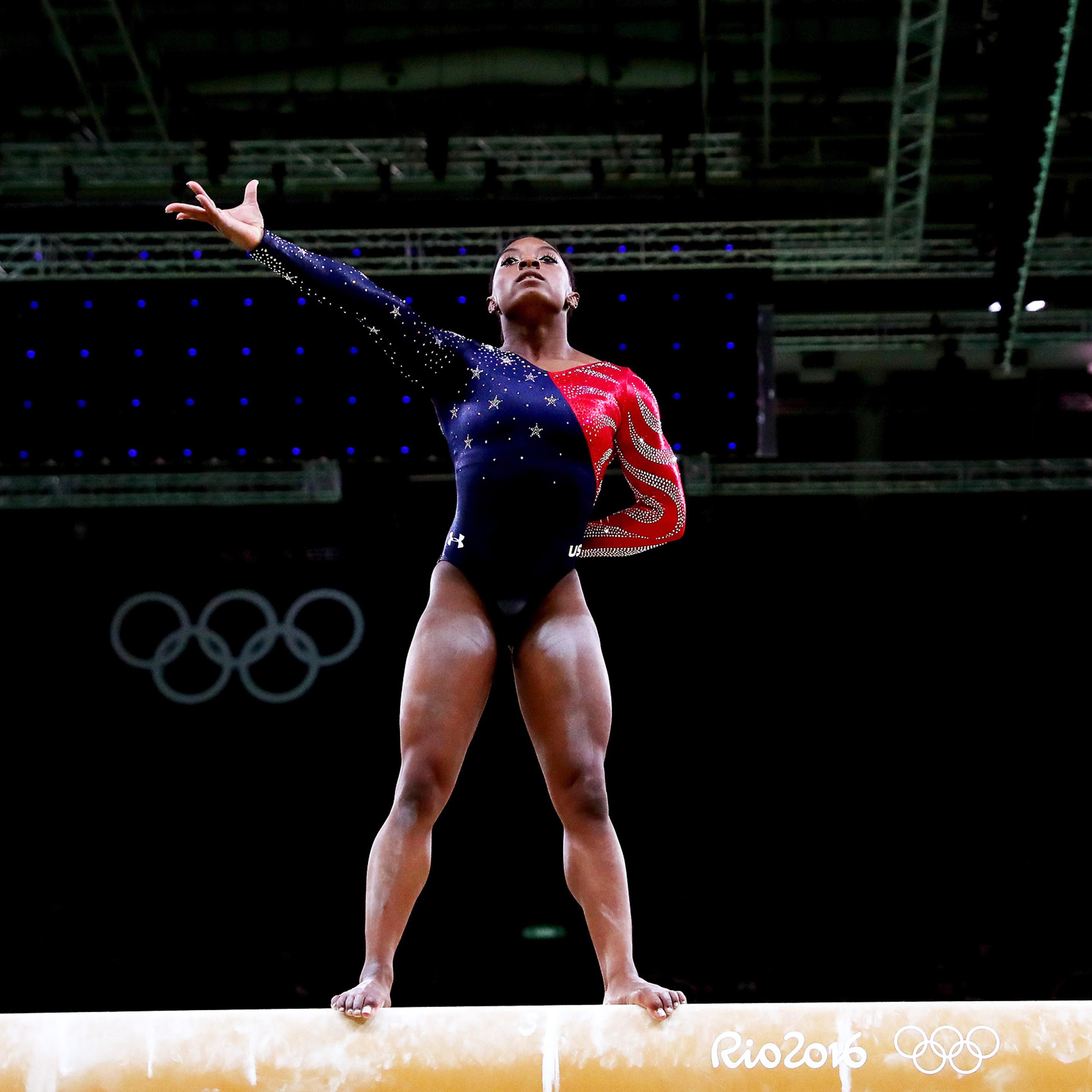 Simone Biles of the United States competes on the balance beam during Women's qualification for Artistic Gymnastics on Day 2 of the Rio 2016 Olympic Games at the Rio Olympic Arena on Aug. 7, 2016.