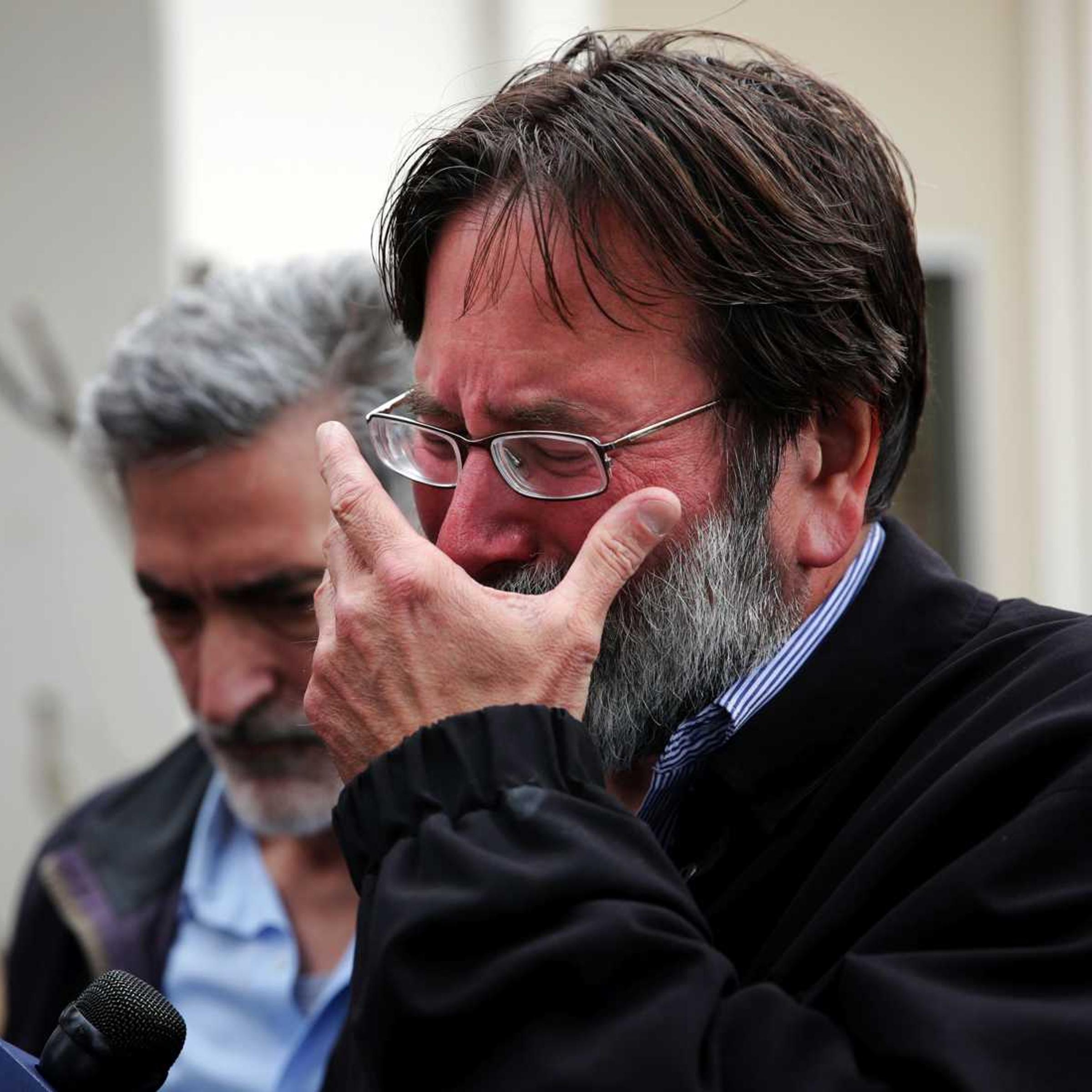 Richard Martinez, whose son Christopher was killed in a mass shooting in Isla Vista, Calif., breaks down as he talks to media outside the Santa Barbara County Sheriff's Office on May 24, 2014, in Santa Barbara, Calif.