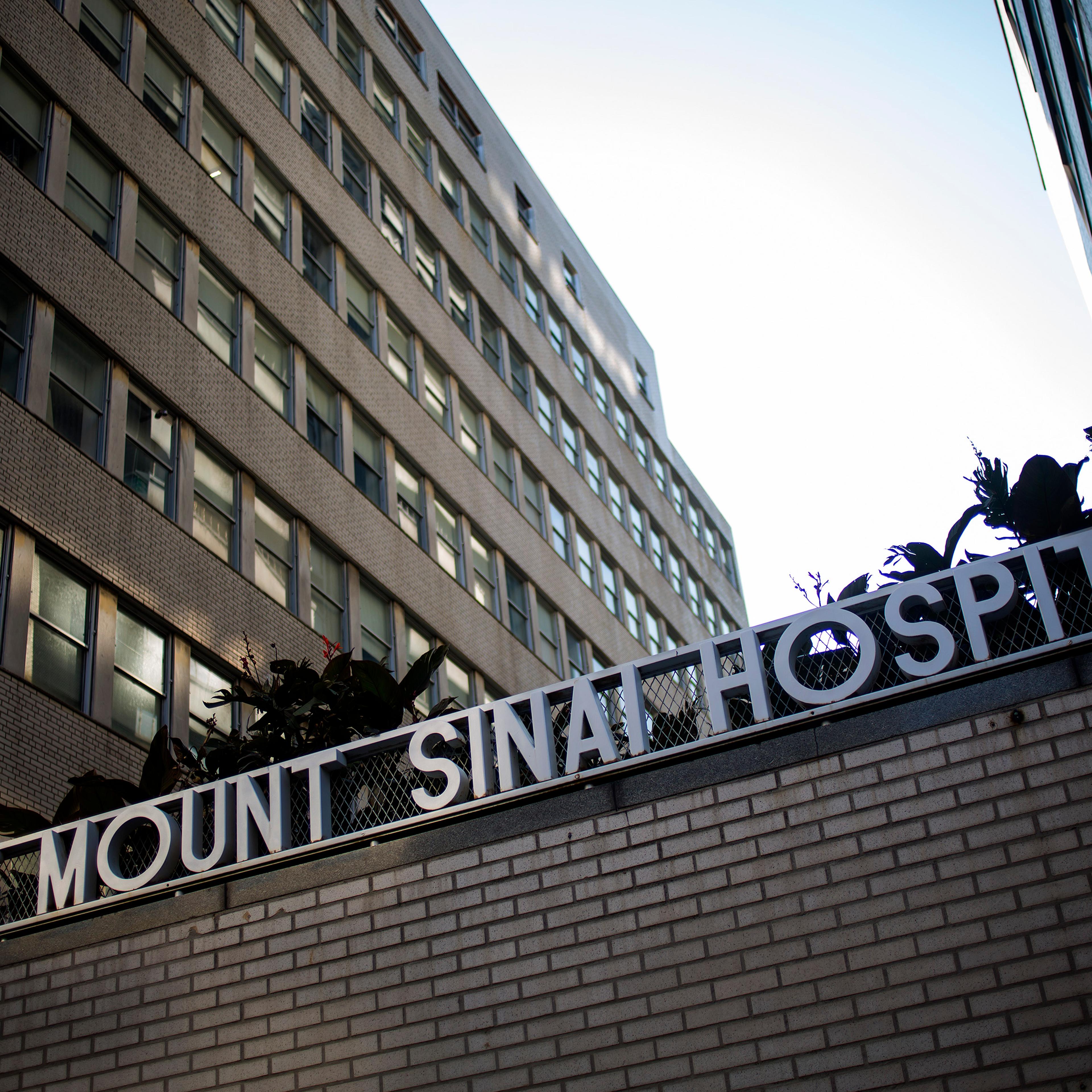 Signage hangs outside Mount Sinai Hospital on August 4, 2014 in New York City.
