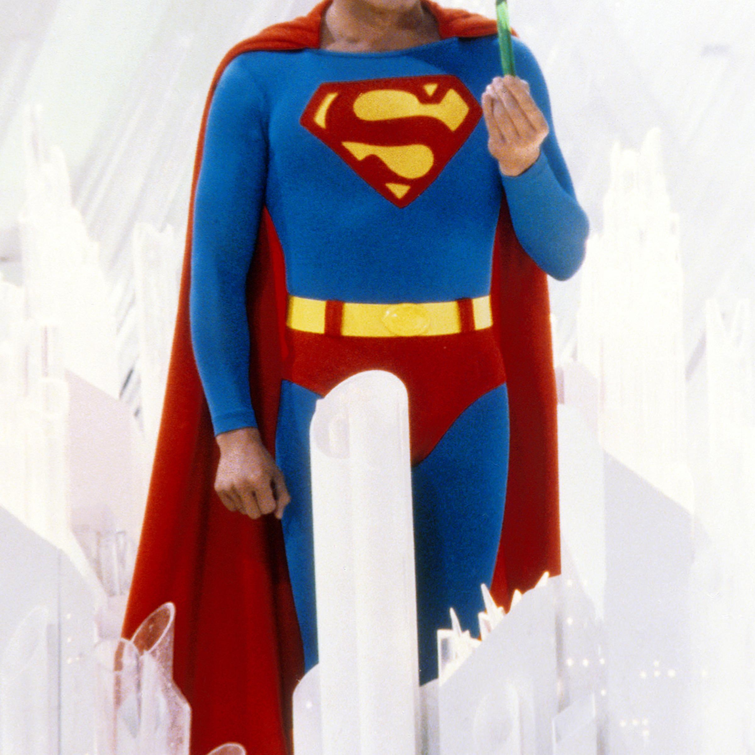 Superman, played by American actor Christopher Reeve (1952 - 2004), holds a green crystal at the Fortress of Solitude, in a promotional still from 'Superman', directed by Richard Donner, 1978.