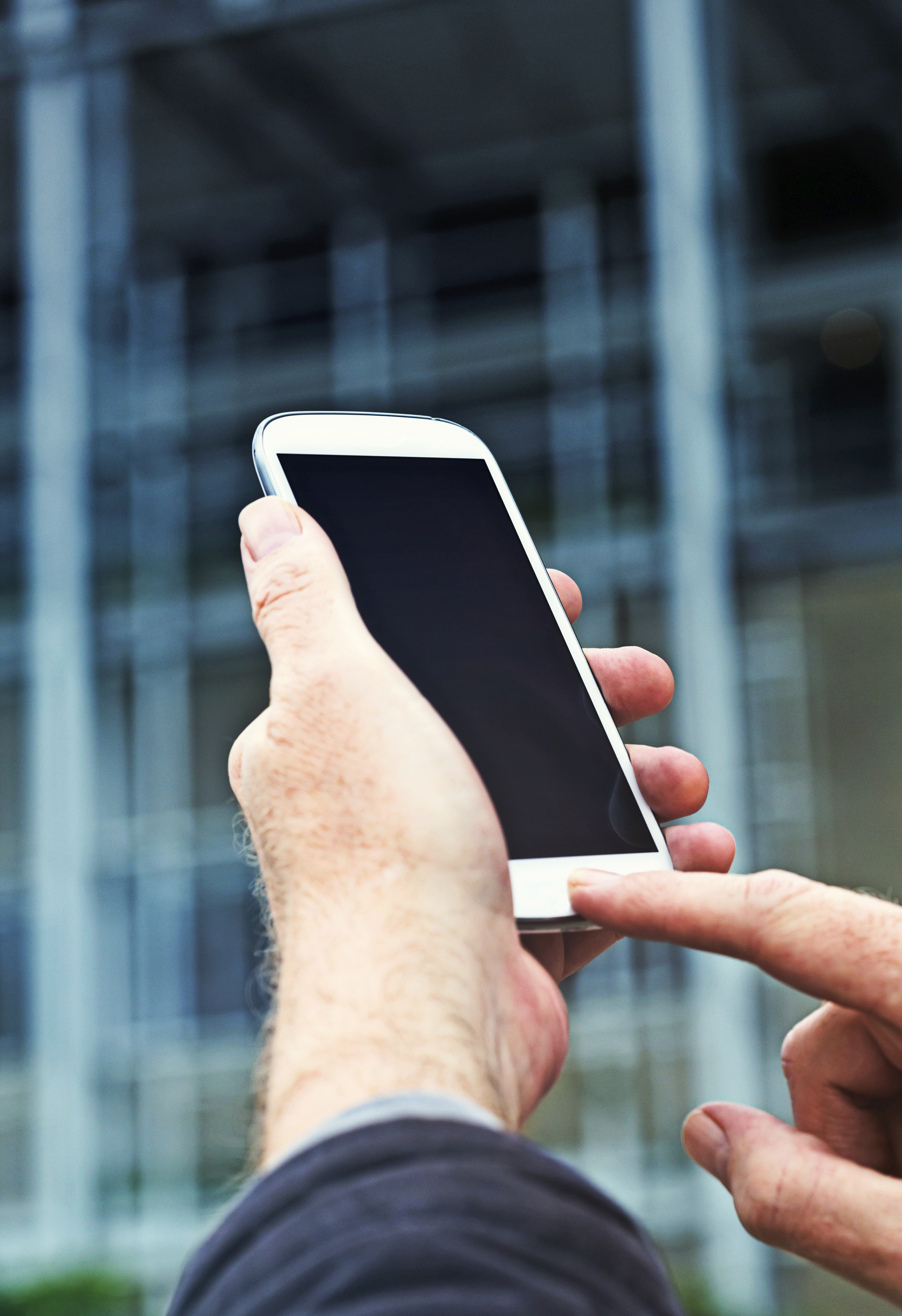 man-holding-android-phone