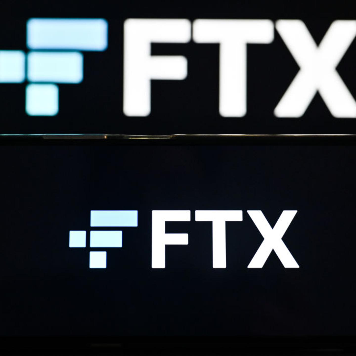 In this photo illustration FTX logo is displayed on a