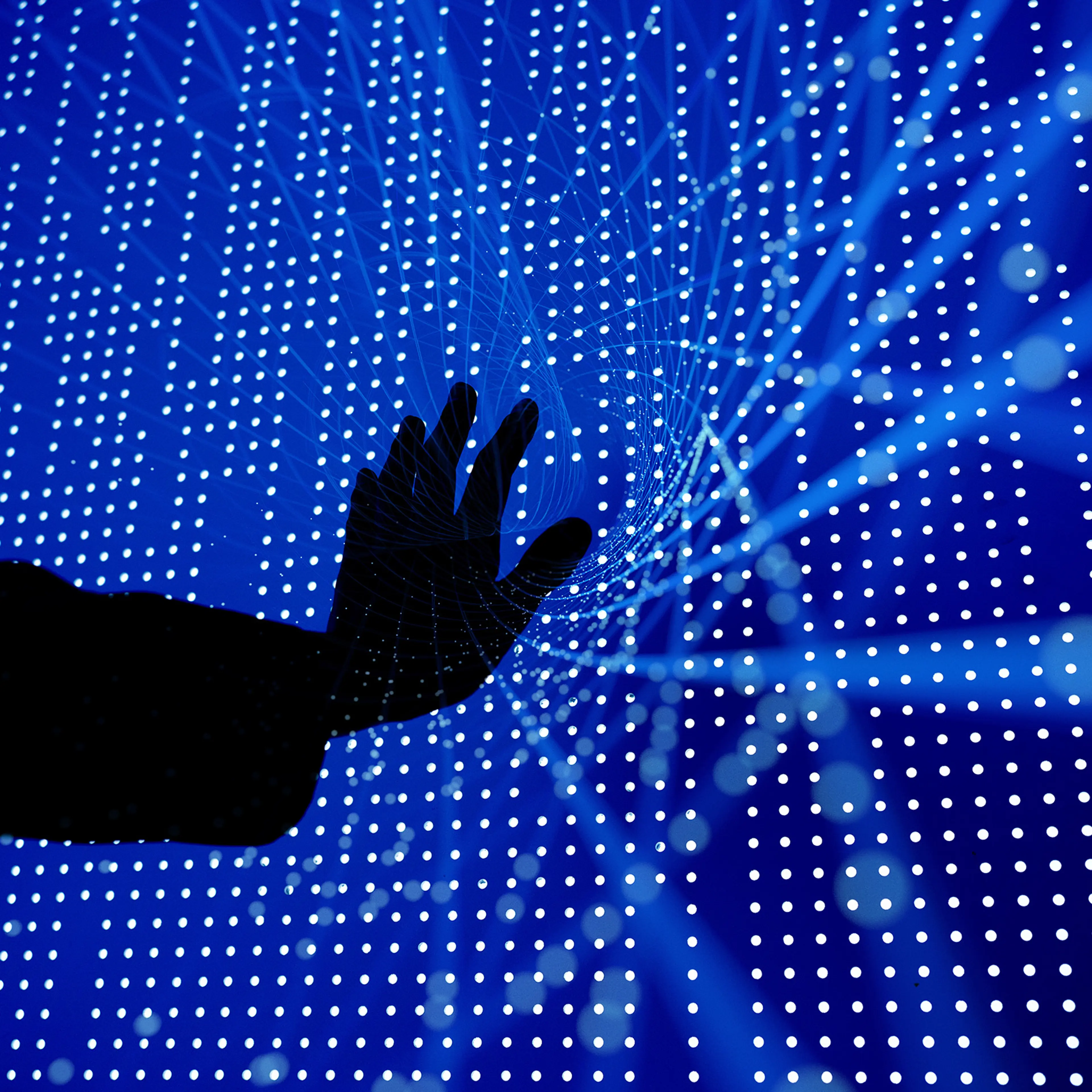 Human hand on screen controlling information.