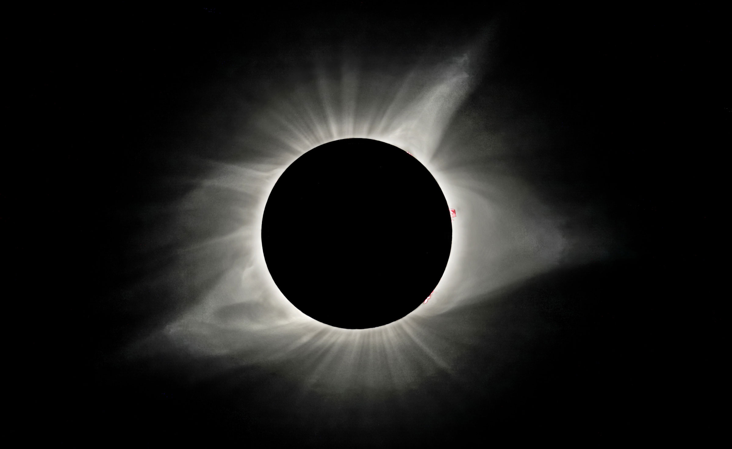 The sun’s corona is visible as the moon obscures the sun during the solar eclipse in Madras, Oregon, on Aug. 21, 2017.