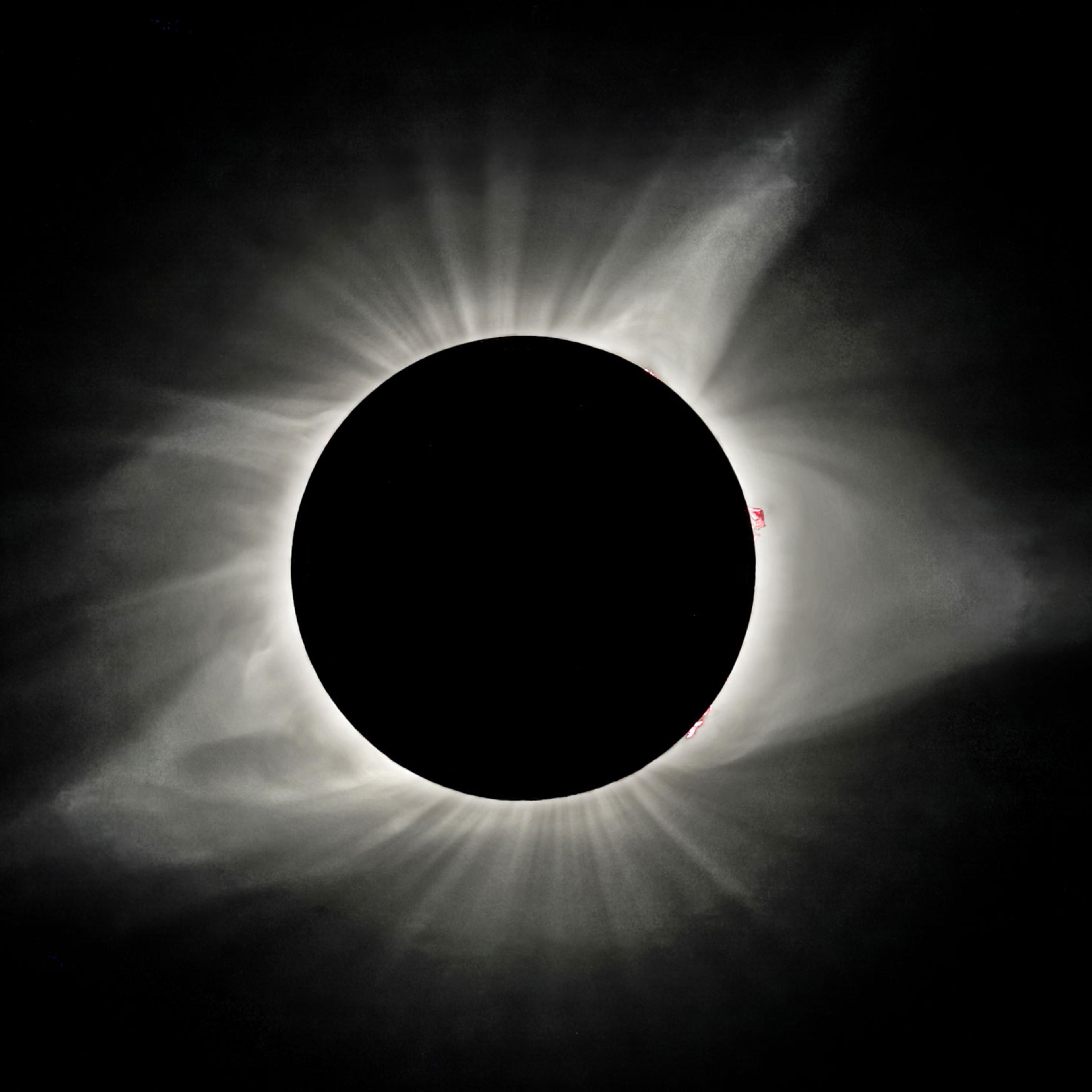 The sun’s corona is visible as the moon obscures the sun during the solar eclipse in Madras, Oregon, on Aug. 21, 2017.