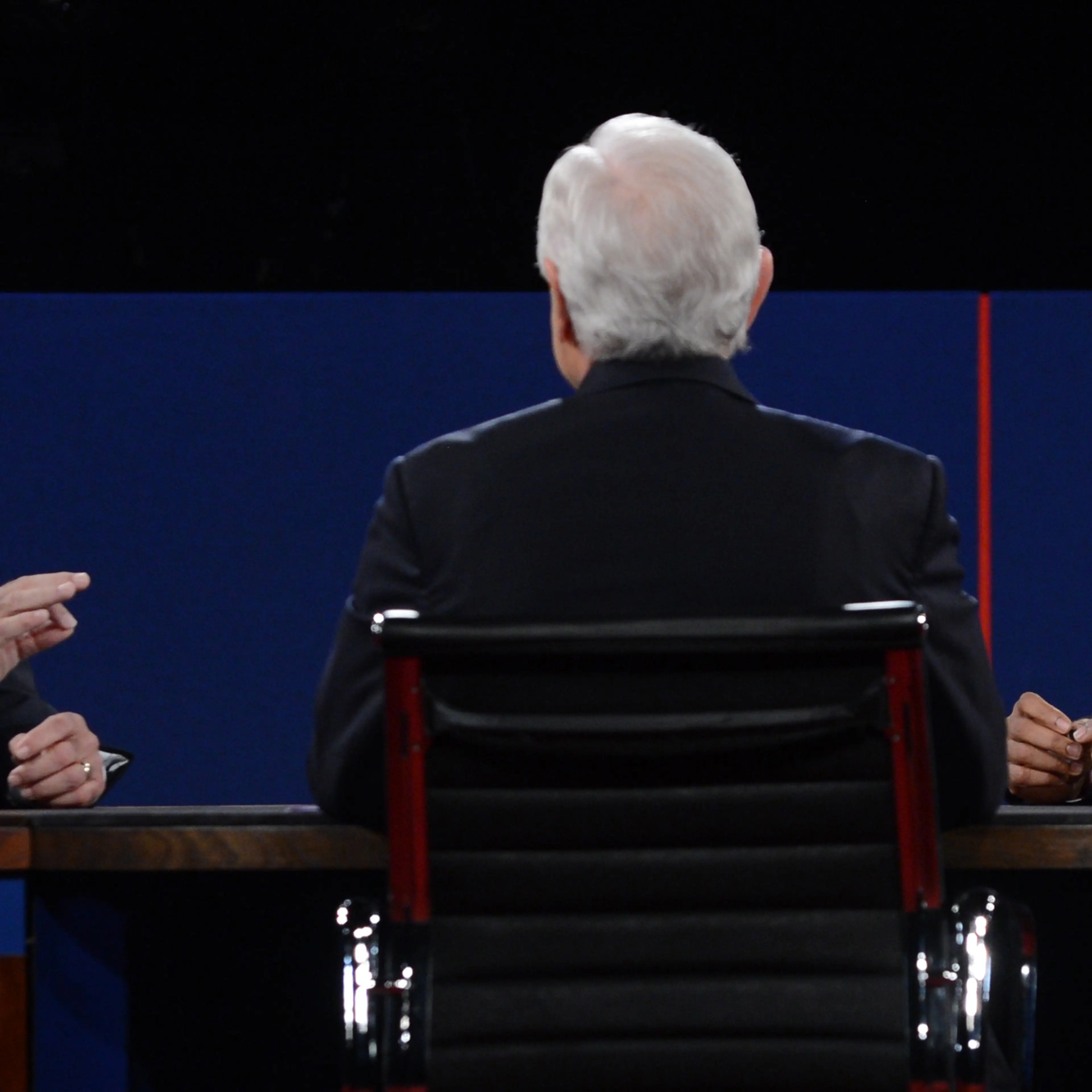 US President Barack Obama and Republican Presidential candidate Mitt Romney participate in the third and final presidential debate, moderated by Bob Schieffer (C) of CBS, at Lynn University in Boca Raton, Florida, Oct. 22, 2012.