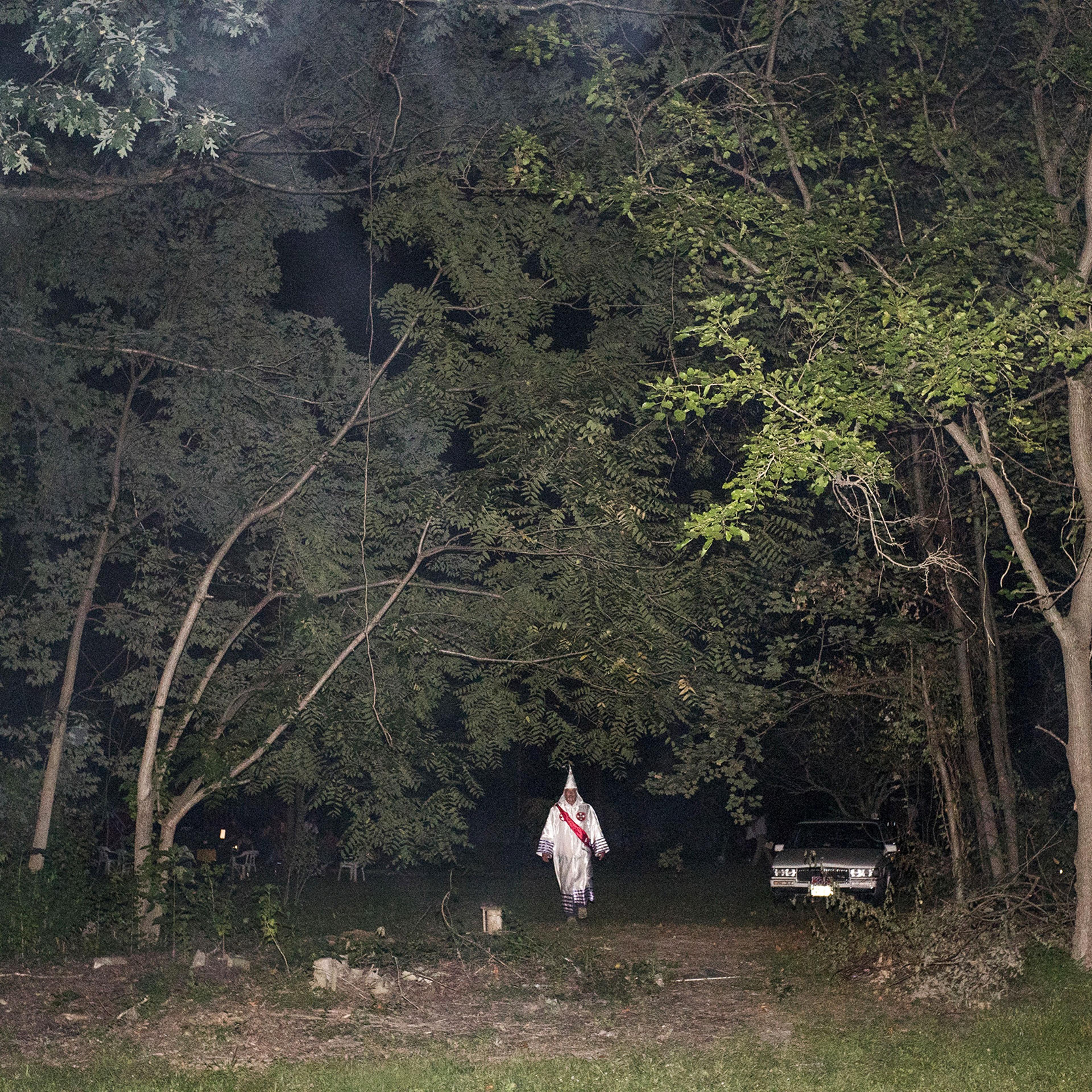 A Ku Klux Klan member in 2015 after a Maryland cross lighting, one of the group’s rituals