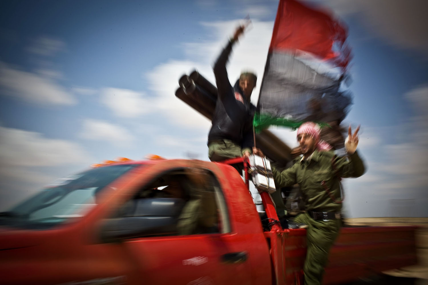 From Hammerl's last file from Benghazi—Rebels en route to the frontline, taken on April 3, 2011.