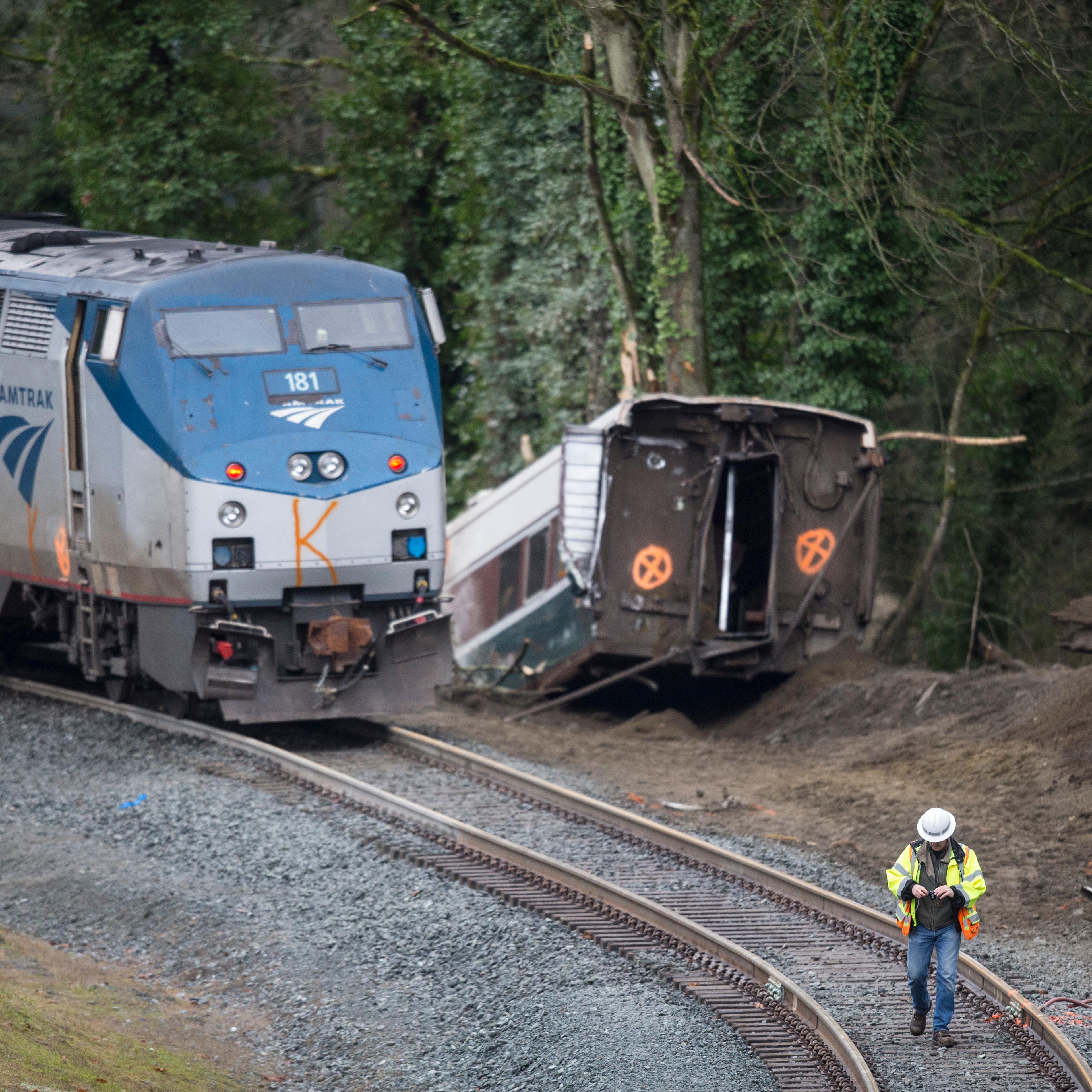 Amtrak Train Derailment South Of Tacoma, Washington Leaves Train Car Dangling Onto Highway