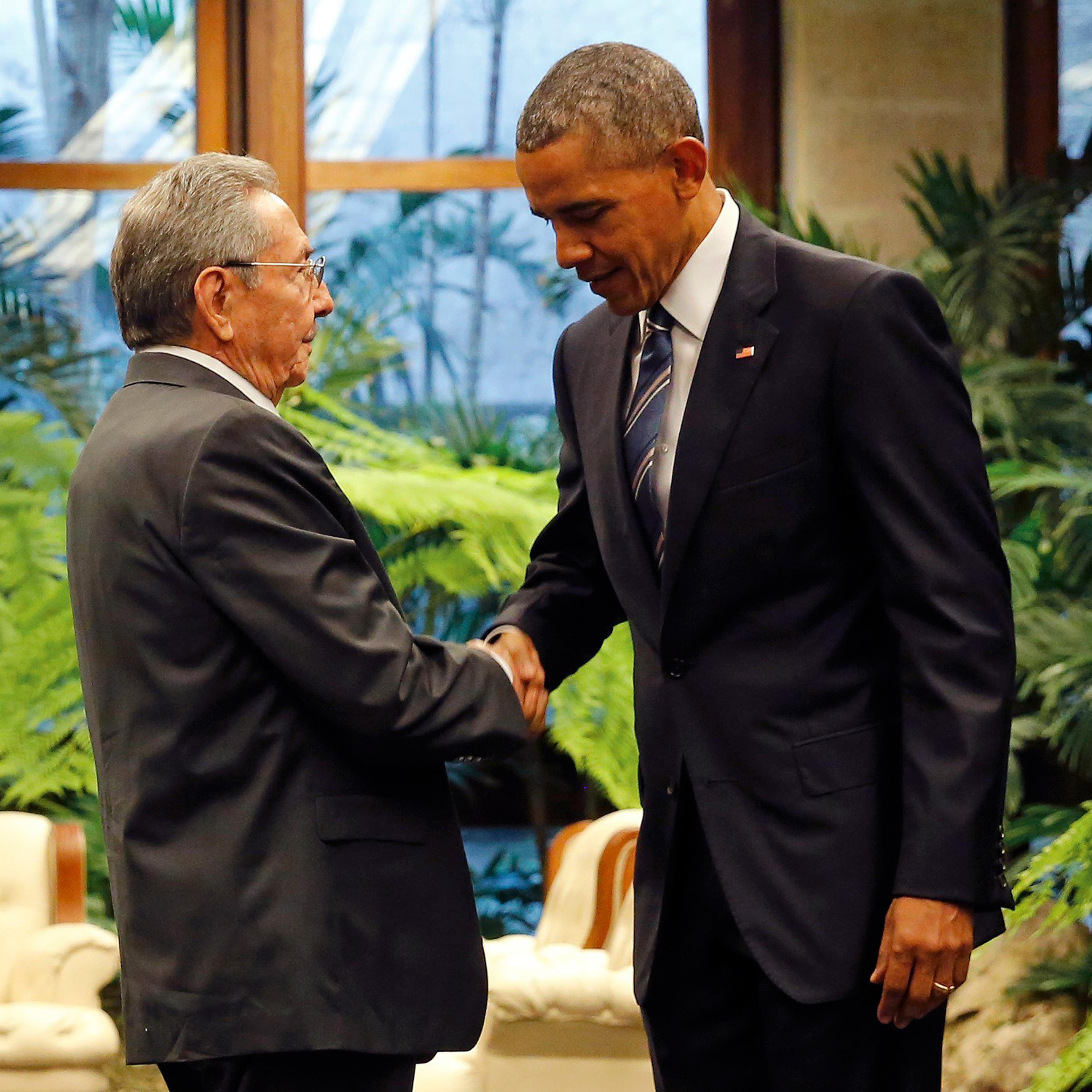 U.S. President Barack Obama and Cuba's President Raul Castro shake hands in Havana