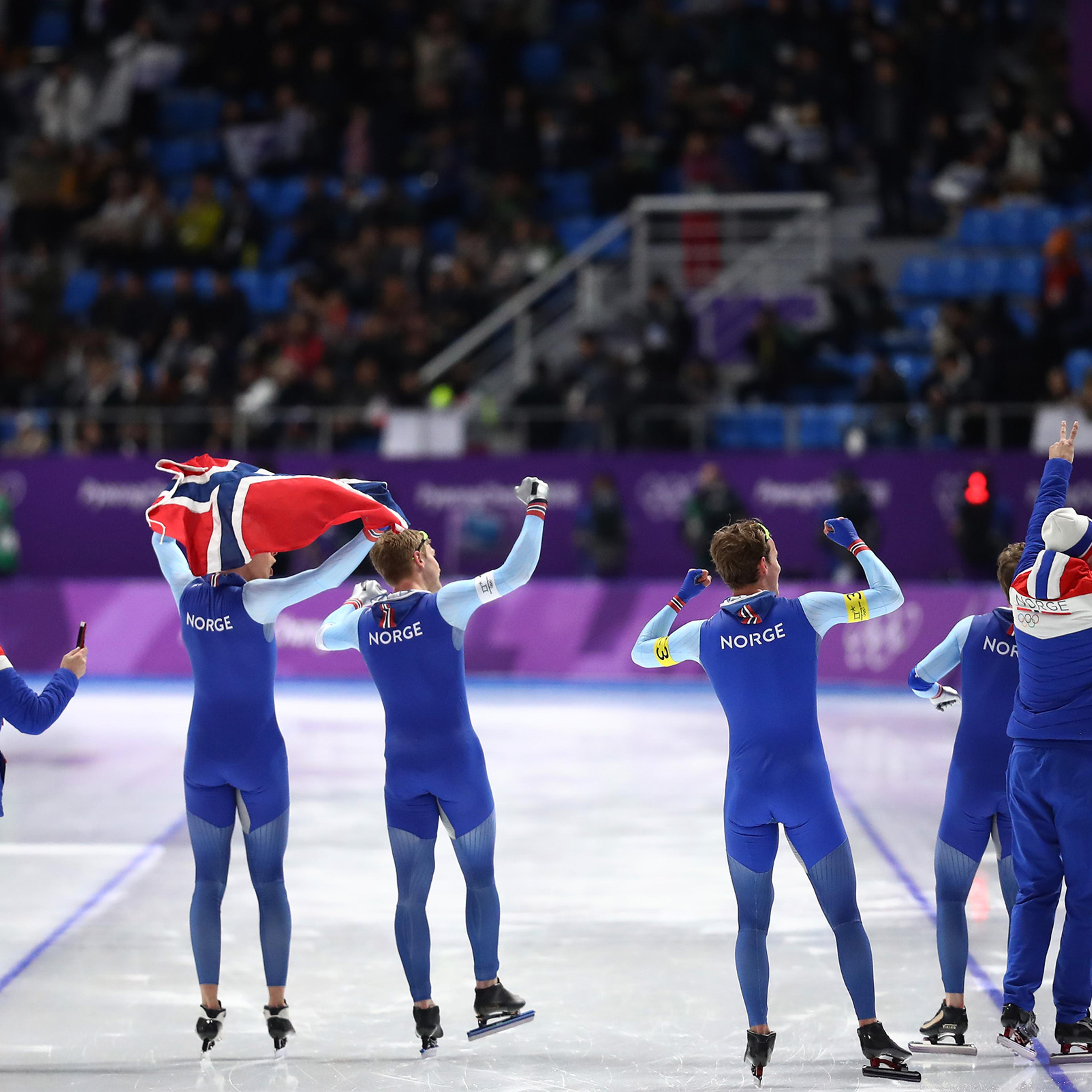 Havard Bokko, Sindre Henriksen, Simen Spieler Nilsen and Sverre Lunde Pedersen of Norway celebrate after winning the gold medal during the Speed Skating Men's Team Pursuit Final on Feb. 21, 2018.