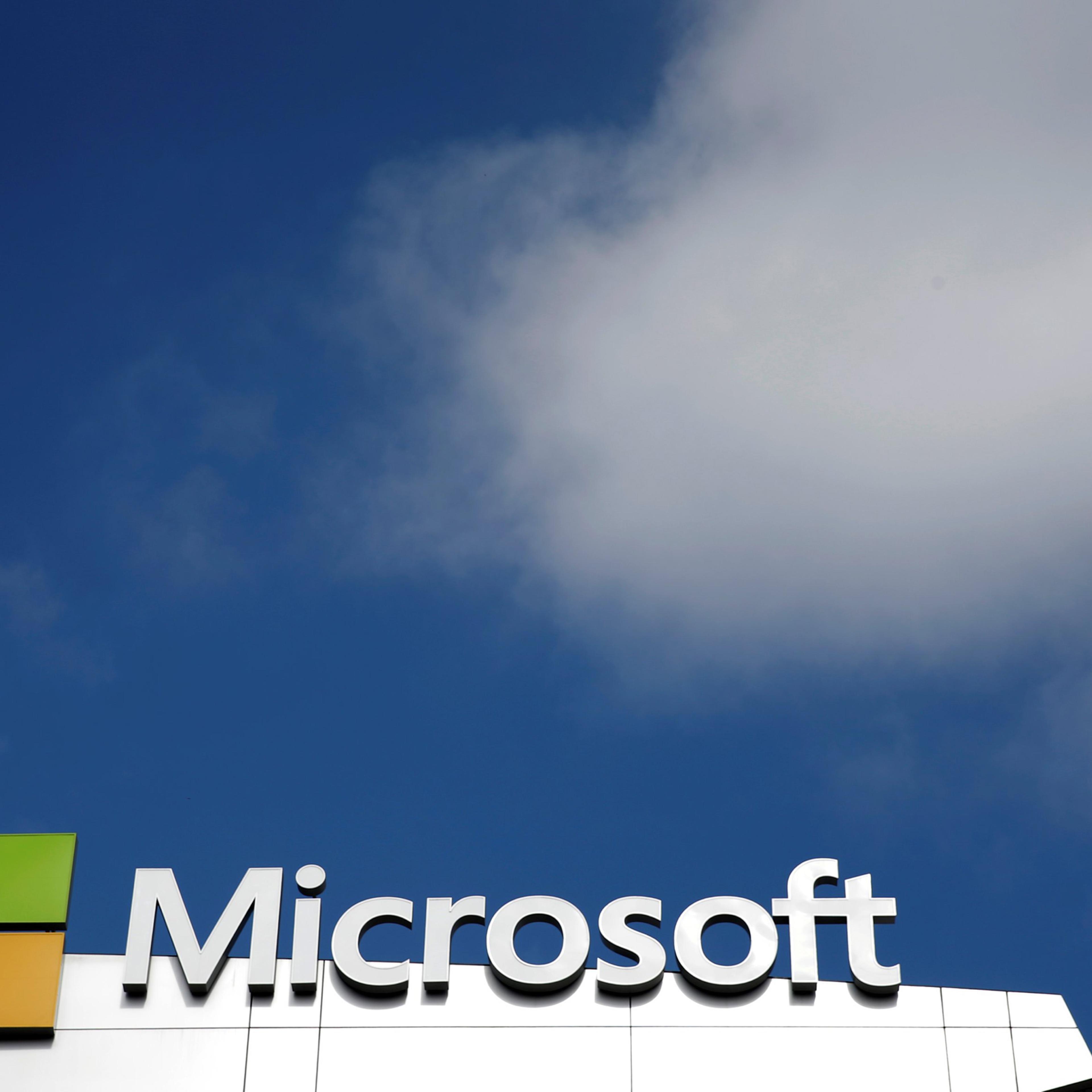 A Microsoft logo is seen next to a cloud the day after Microsoft Corp's $26.2 billion purchase of LinkedIn Corp, in Los Angeles on June 14, 2016.