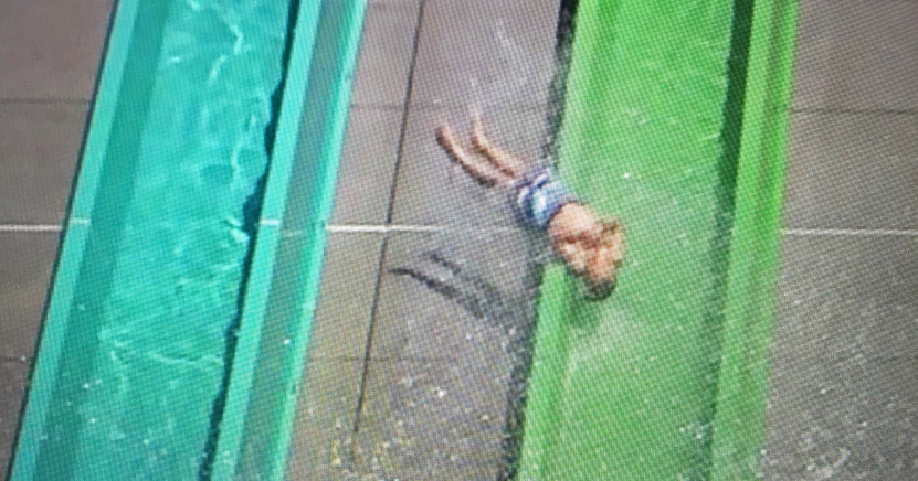 A child is thrown out of the Emerald Plunge water slide during the opening day of The Wave water park in Dublin, Calif., on Saturday, May 27, 2017. The child landed on the concrete next to the slide and was taken to the office by park personnel. (Jose Ca