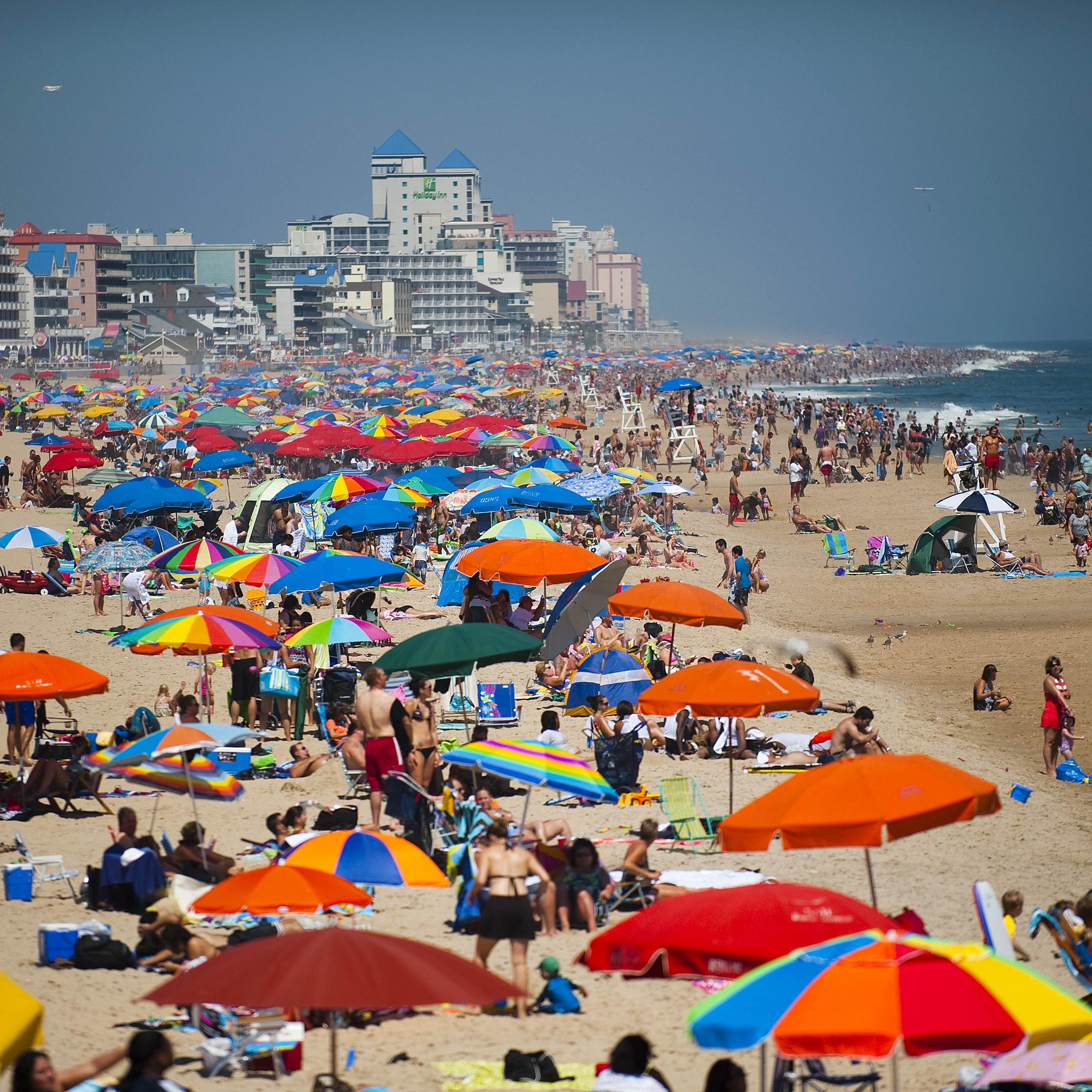 People line the beach in Ocean City, Mar