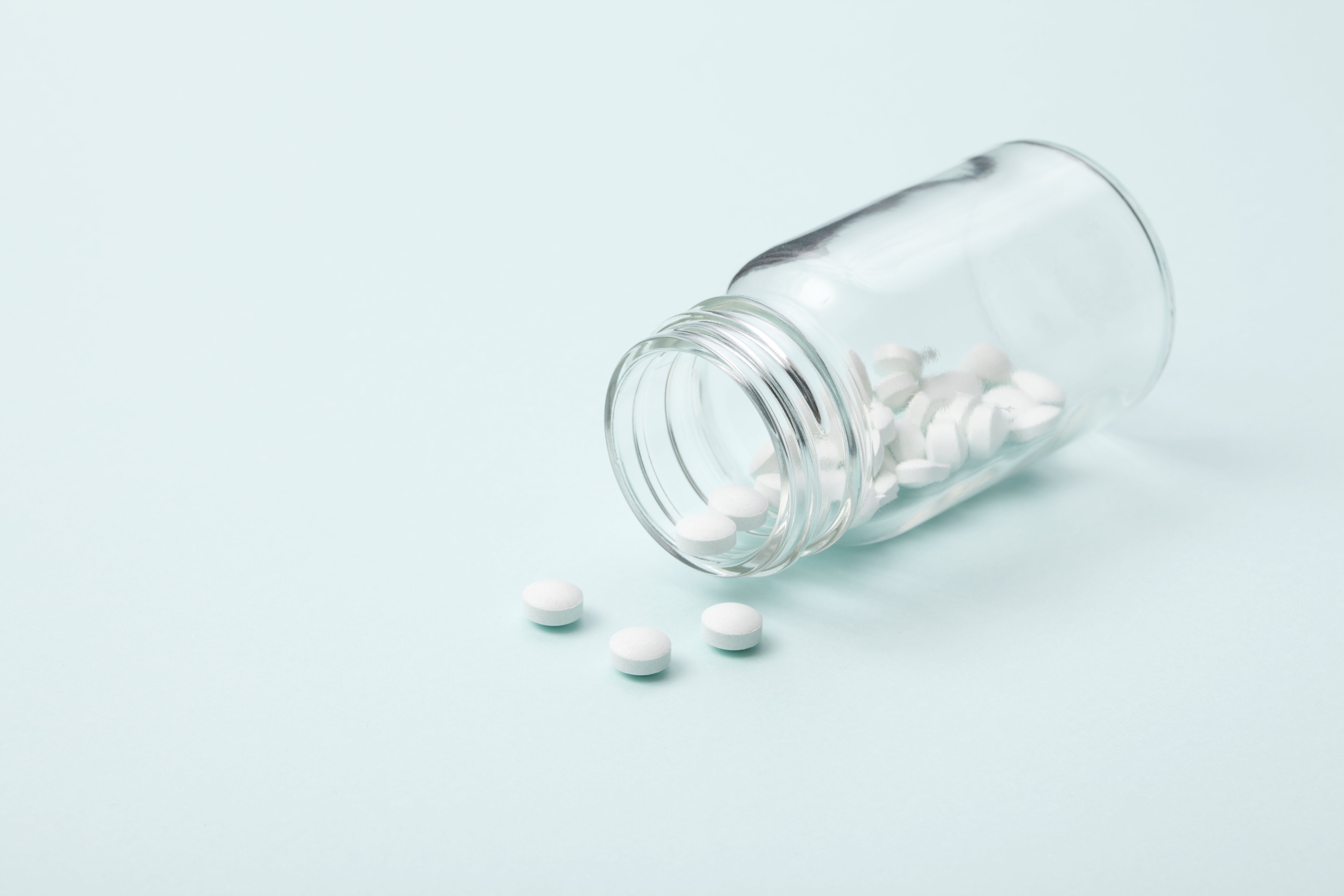 White tablet with a glass bottle TIME health stock