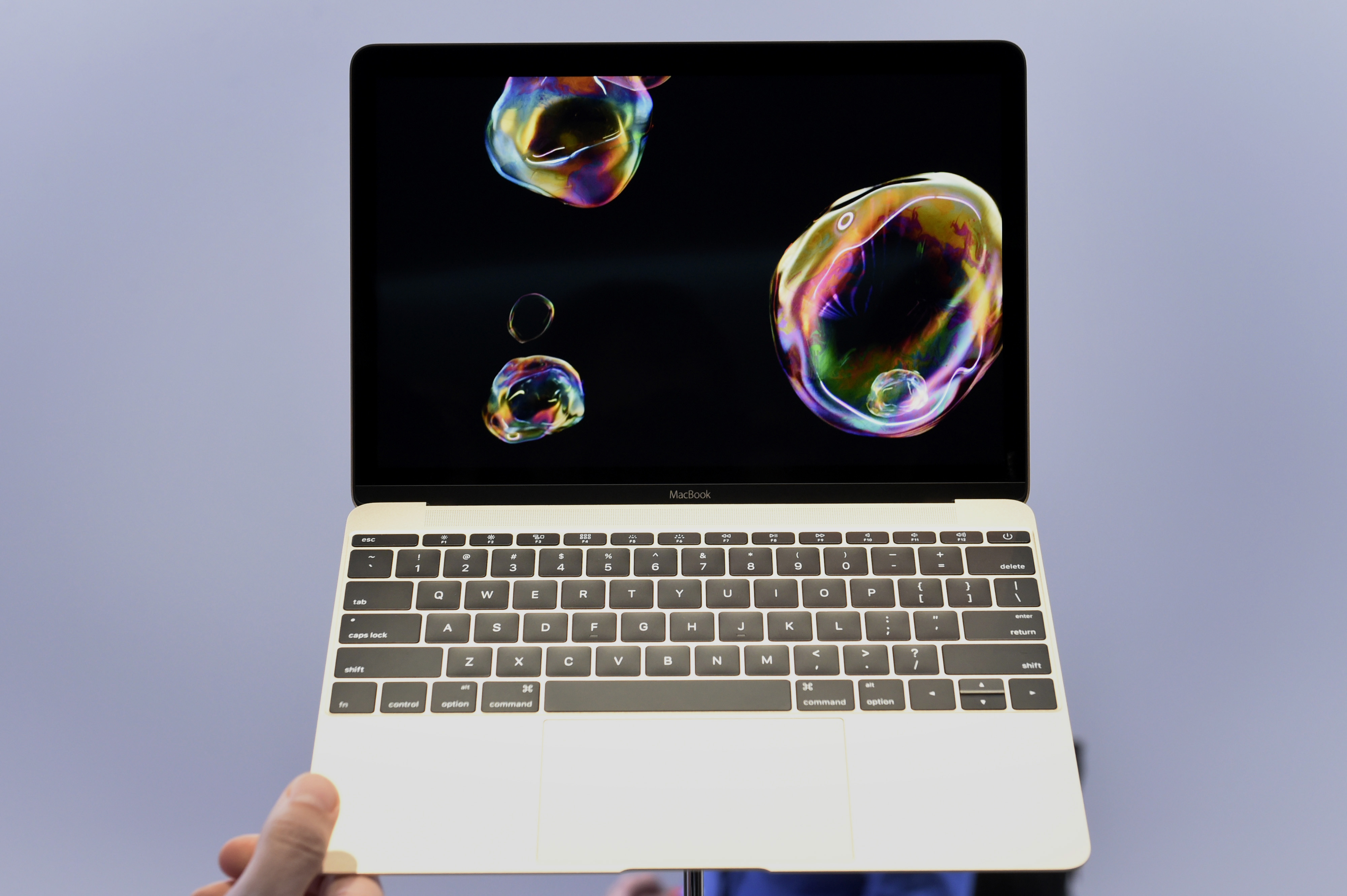 The new gold edition Macbook laptop is displayed during the Apple Inc. Spring Forward event in San Francisco, California, U.S., on Monday, March 9, 2015. Apple Inc. began showing off features and applications for its first new device in five years, a sma