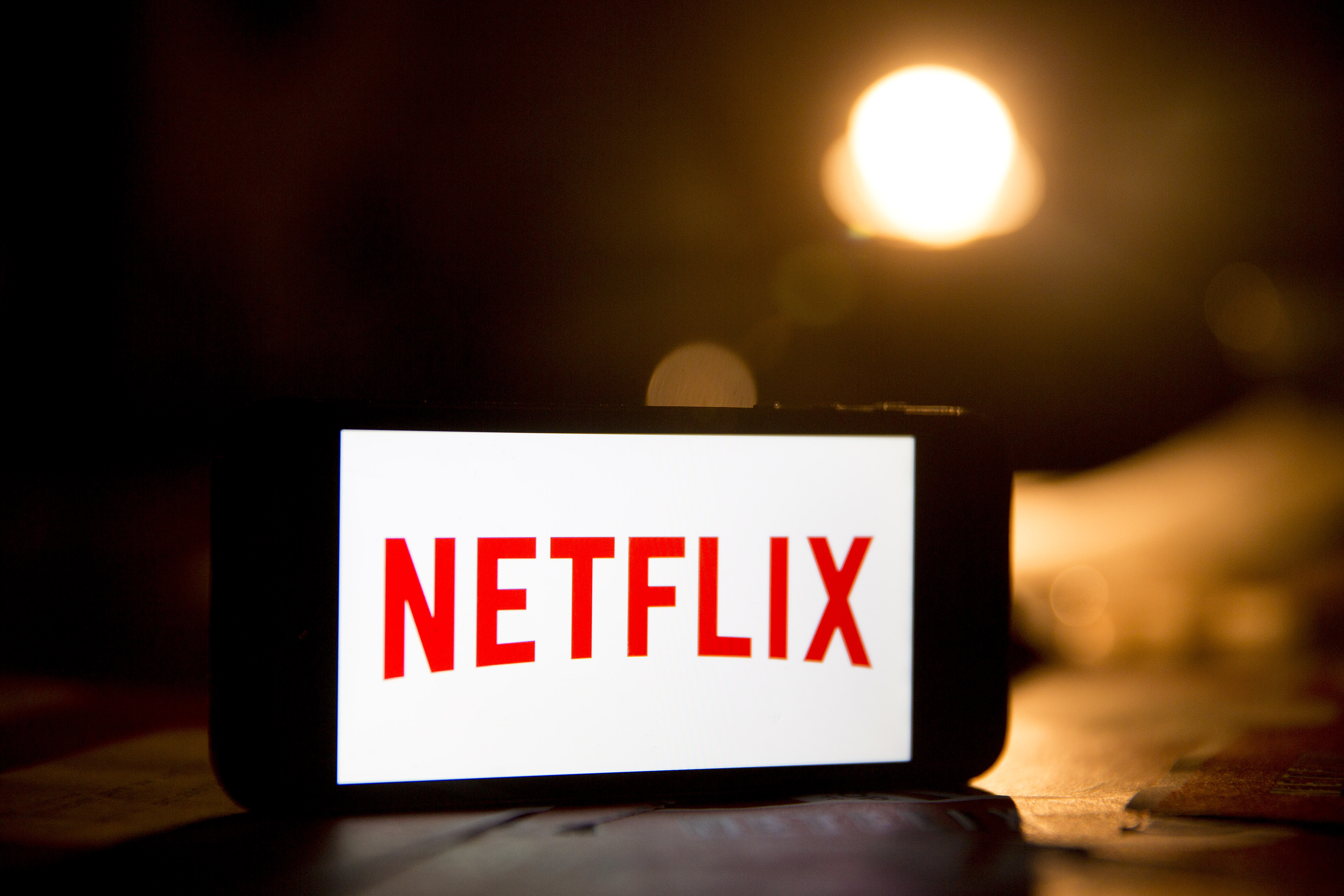 The Netflix Inc. logo is displayed on an Apple Inc. iPhone 5s for a photograph in Washington, D.C., U.S., on Tuesday, April 14, 2015.