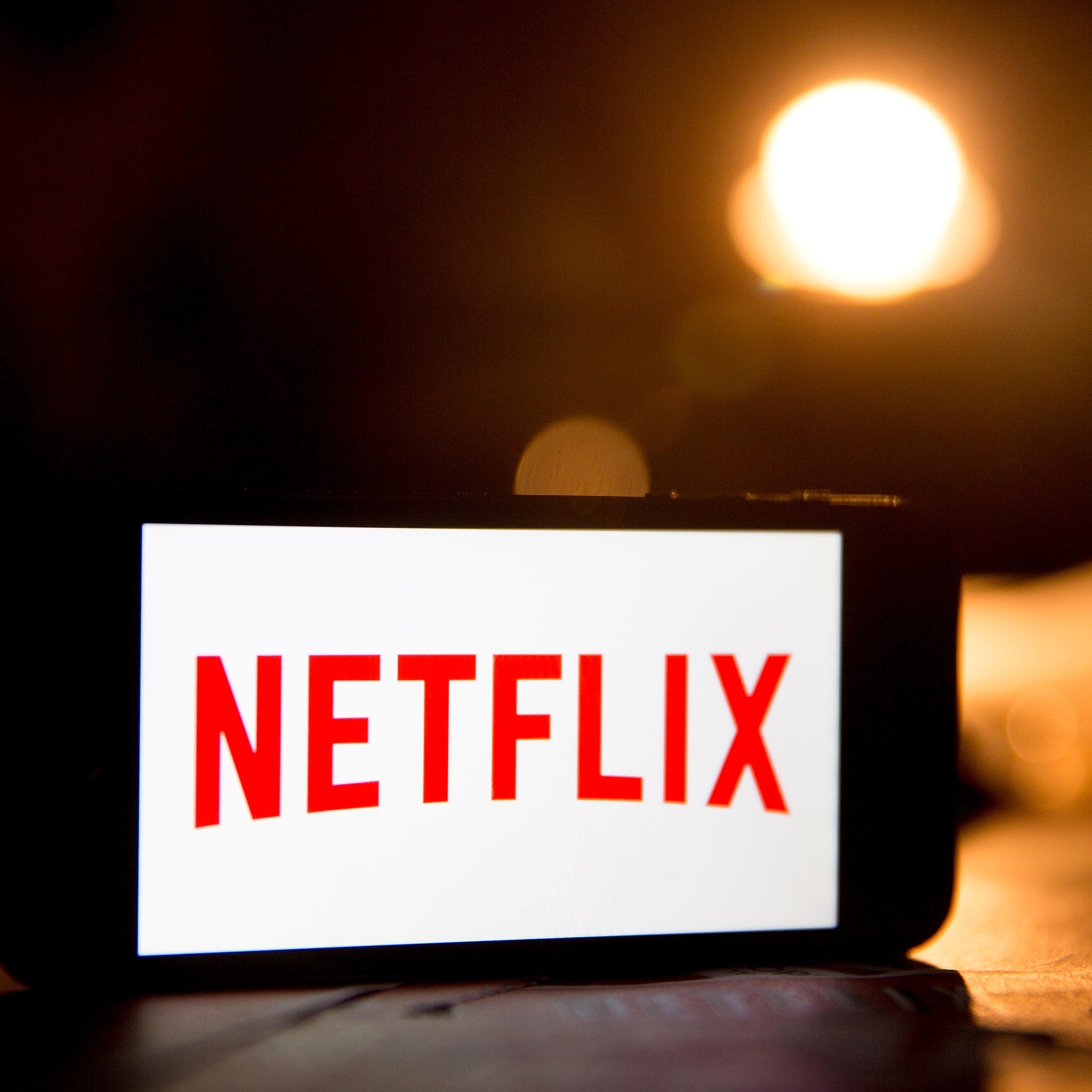 The Netflix Inc. logo is displayed on an Apple Inc. iPhone 5s for a photograph in Washington, D.C., U.S., on Tuesday, April 14, 2015.