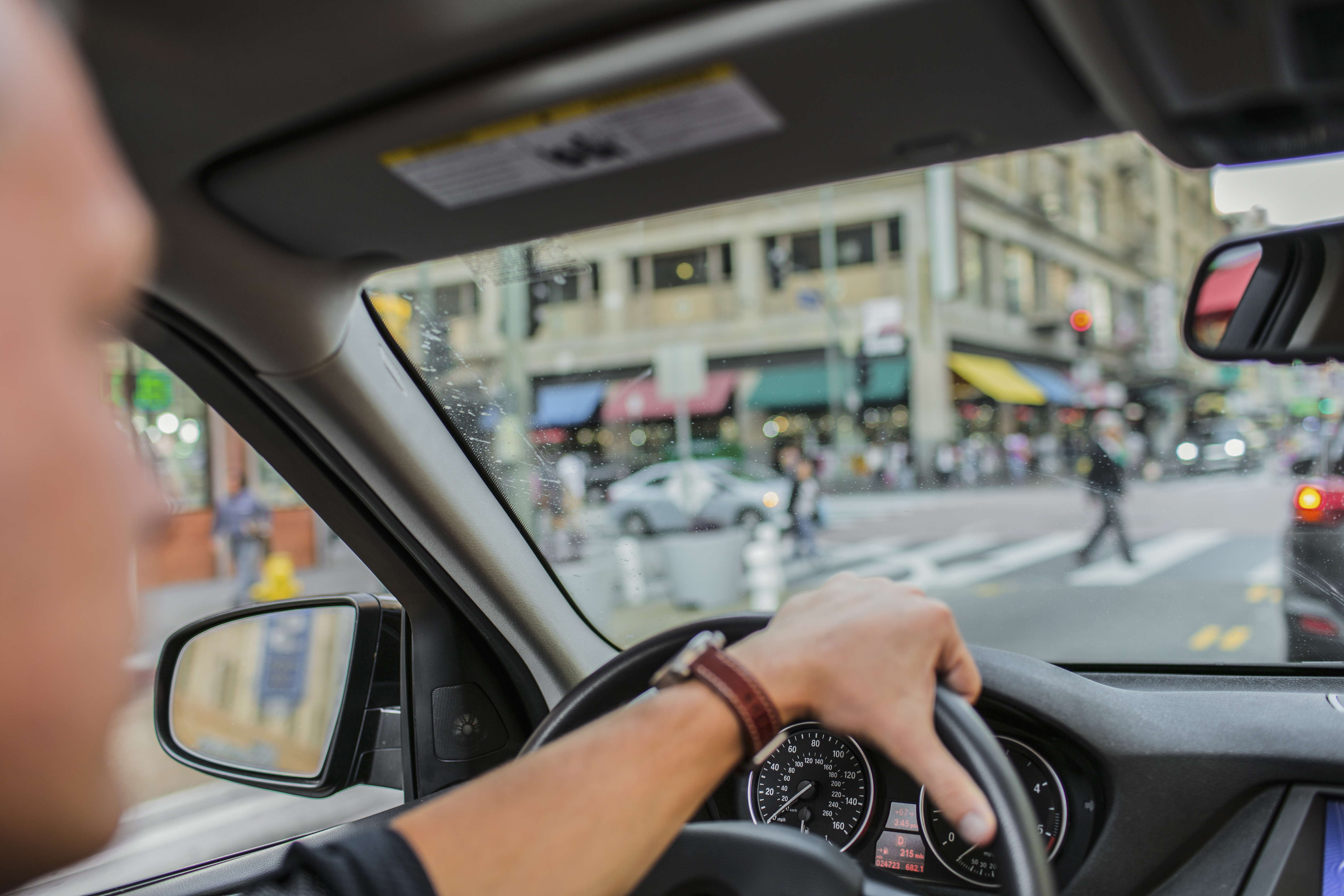 man-driving-city