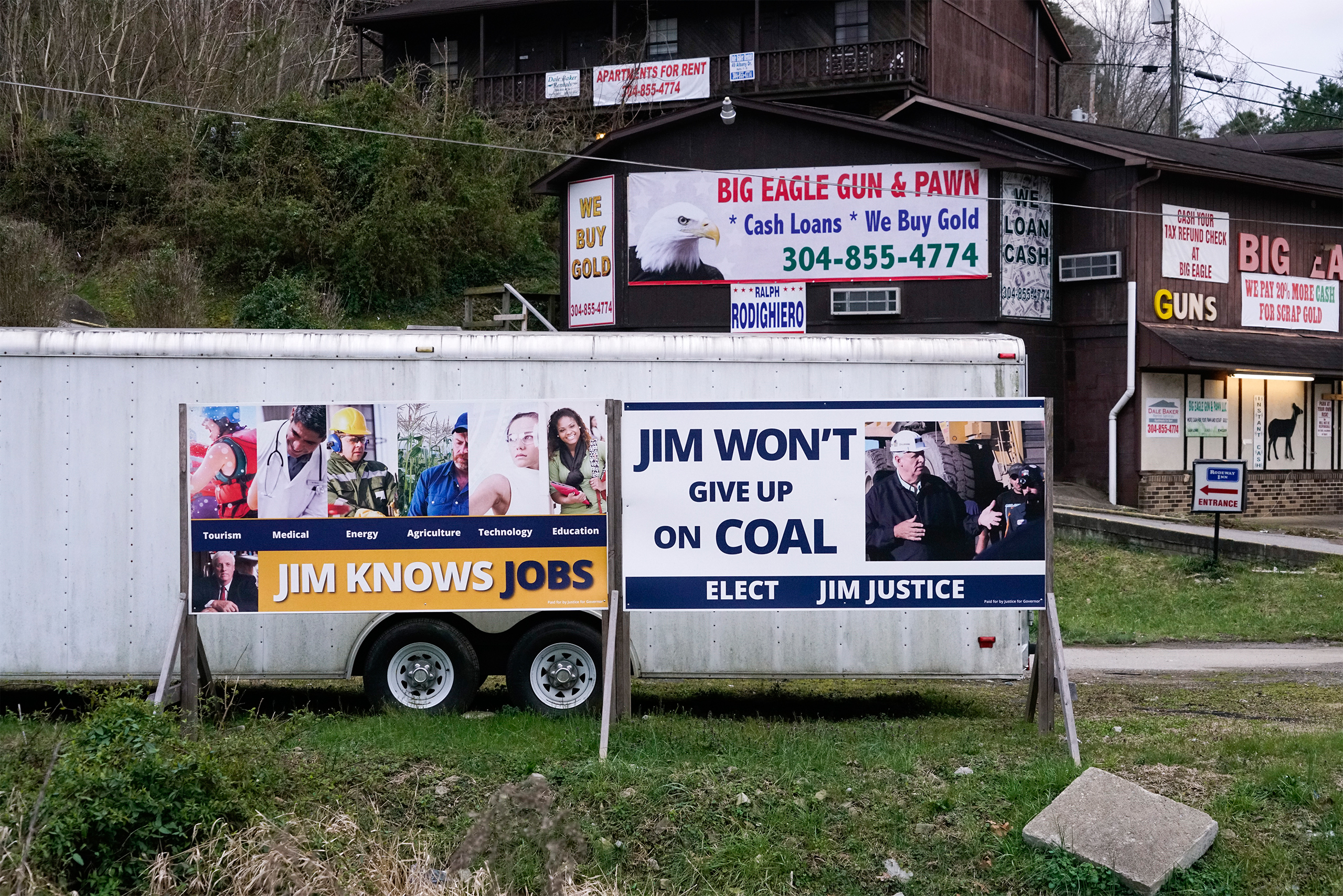 Election posters for Jim Justice (now Governor of West Virginia) appear in Chapmanville, W.Va., on Mar. 18, 2017.