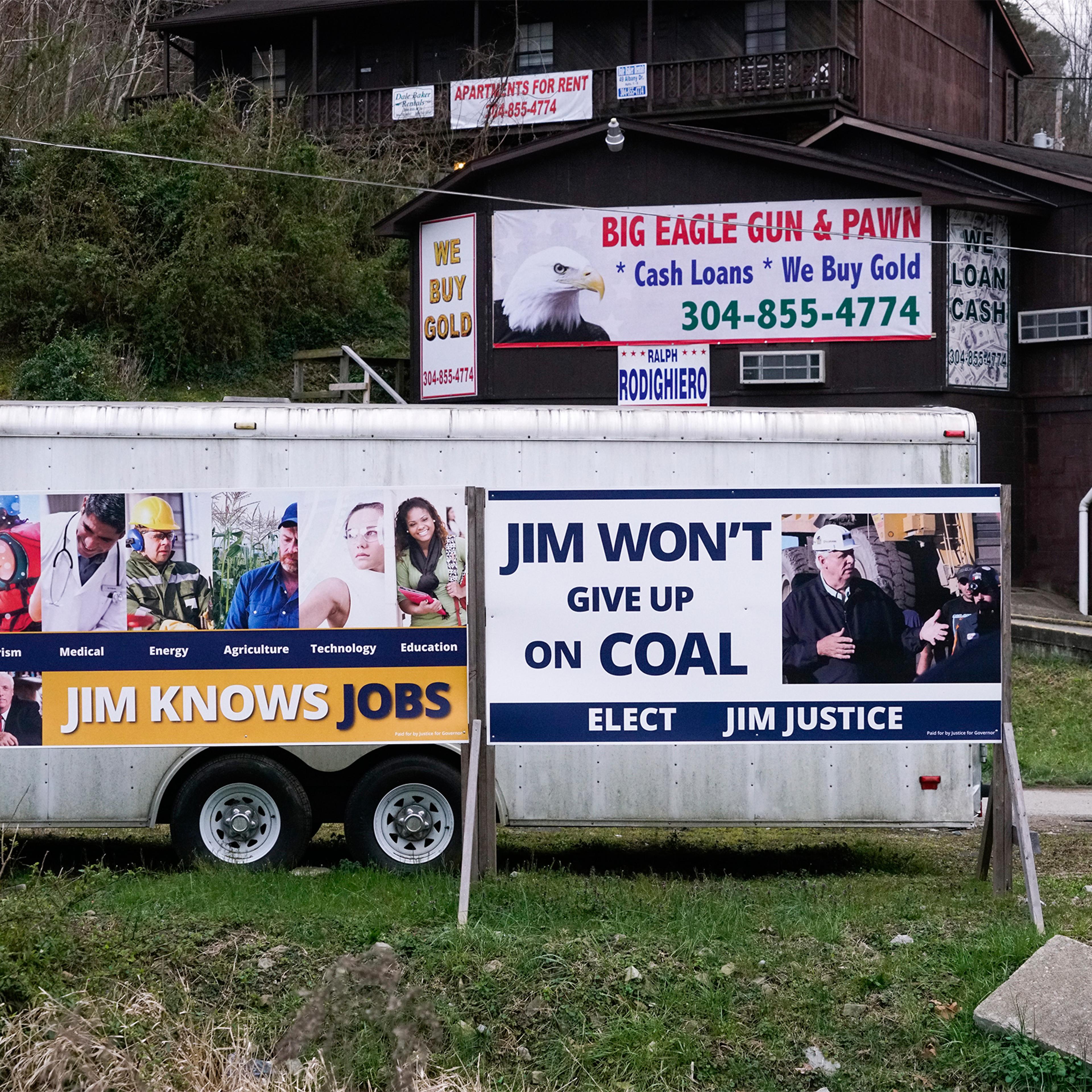 Election posters for Jim Justice (now Governor of West Virginia) appear in Chapmanville, W.Va., on Mar. 18, 2017.