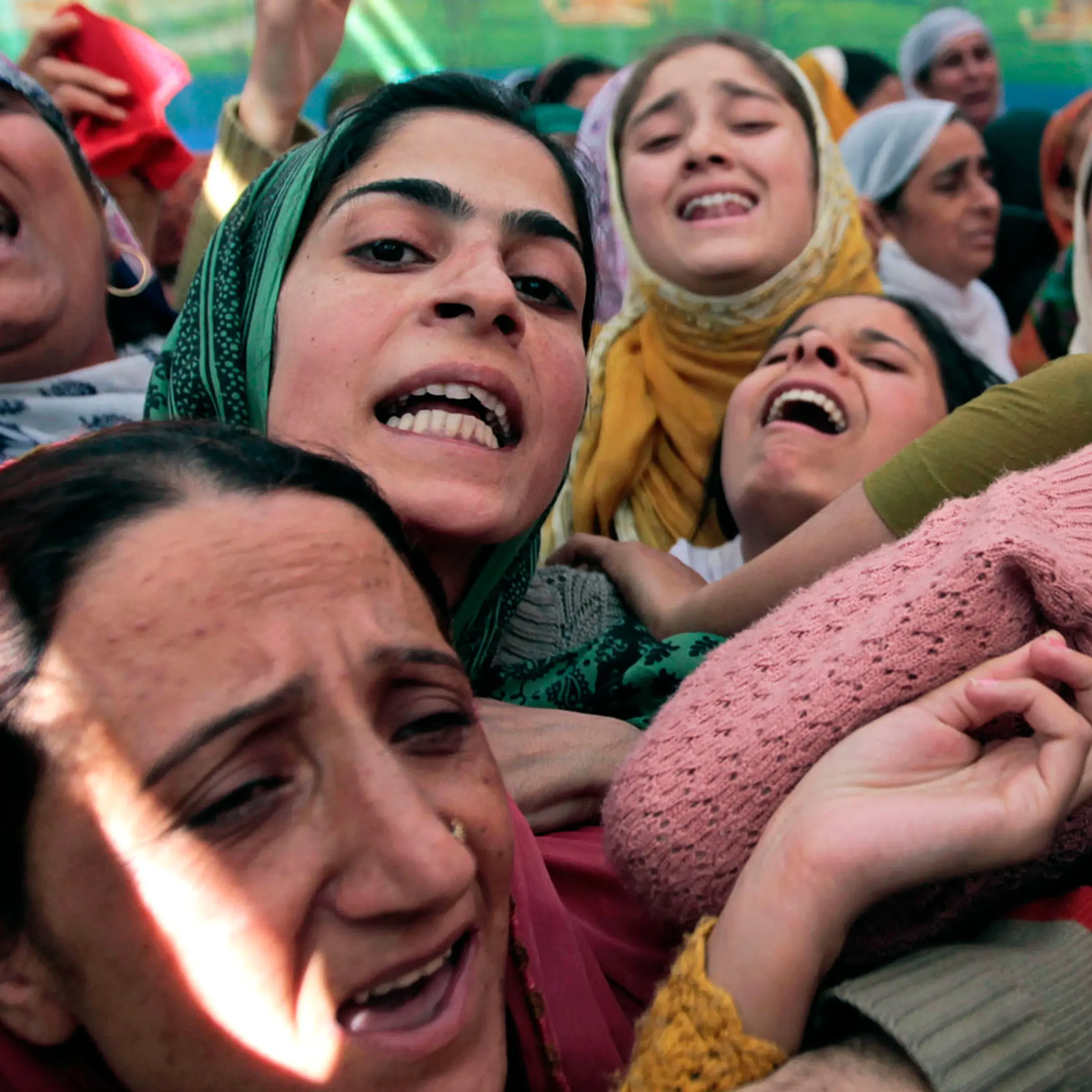 October 1, 2011. Mourners wail at the funeral of Haji Syed Mohammad Yousuf, a 61-year-old retired teacher in Indian-controlled Kashmir who died in police custody on September 30 after being arrested on suspicion of accepting bribes.