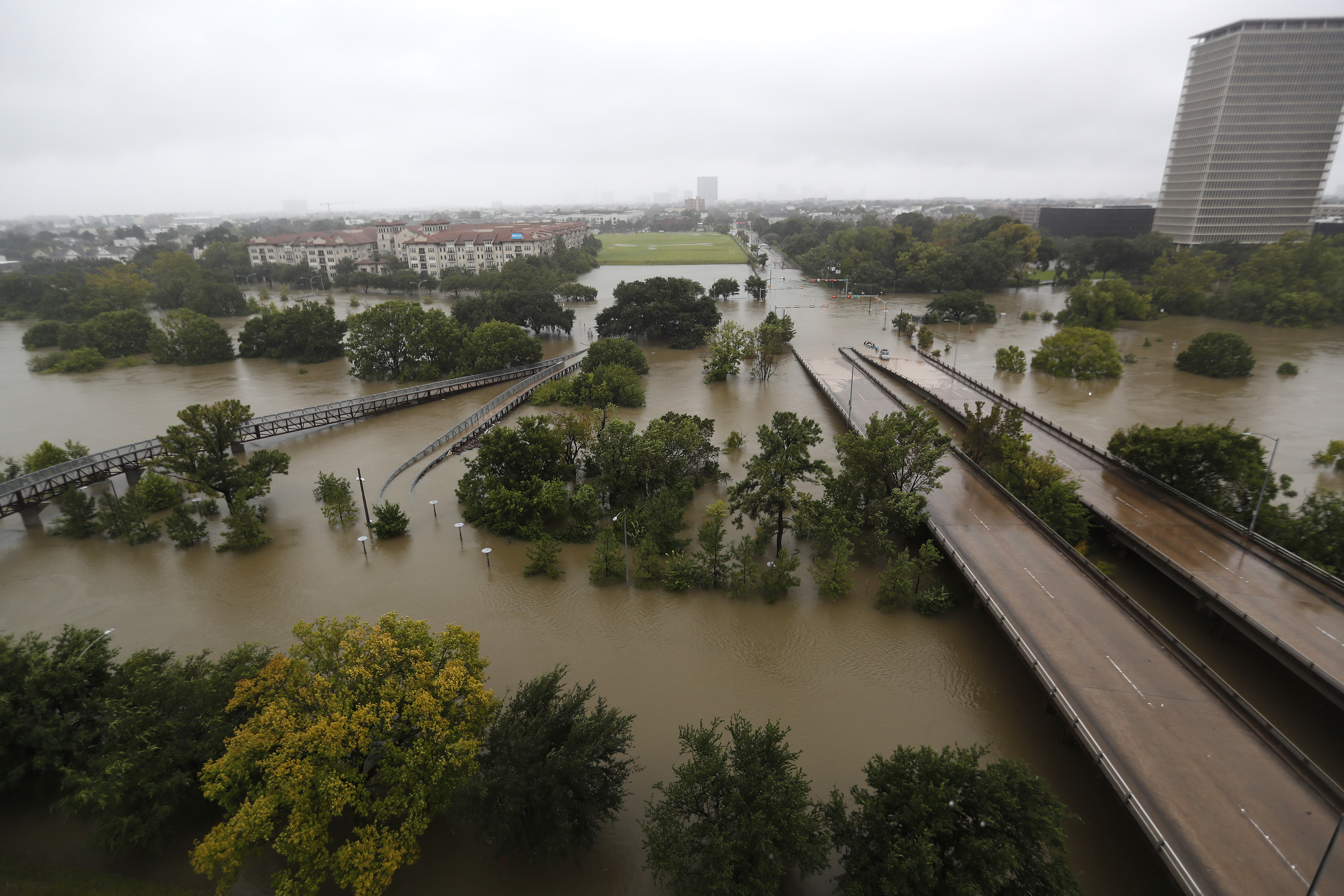 An overhead view of the flooding in Houston, from Buffalo Bayou on Memorial Drive and Allen Parkway, as heavy rains continued falling from Tropical Storm Harvey, Monday, Aug. 28.