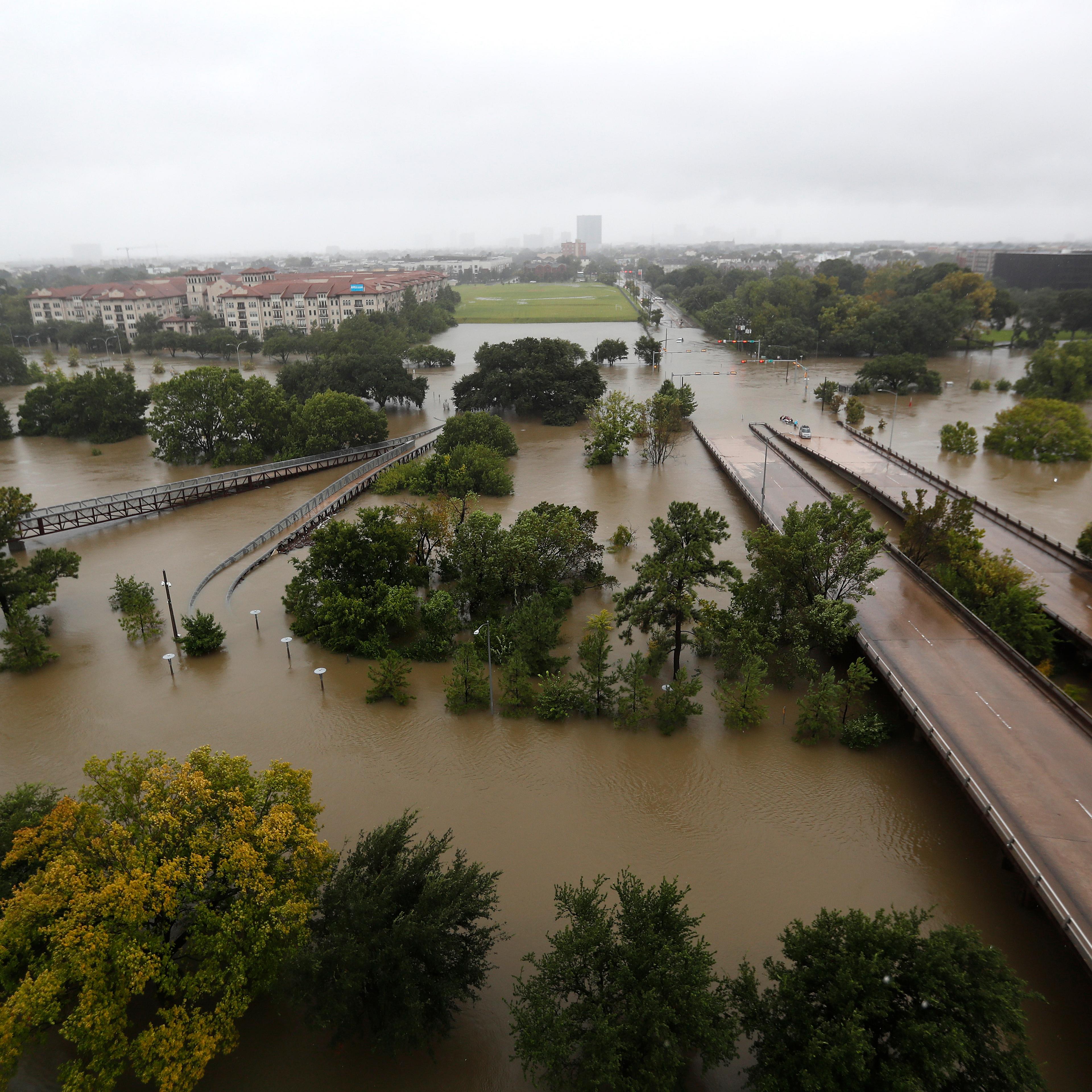 An overhead view of the flooding in Houston, from Buffalo Bayou on Memorial Drive and Allen Parkway, as heavy rains continued falling from Tropical Storm Harvey, Monday, Aug. 28.