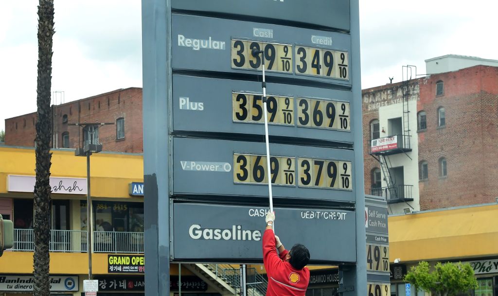Gas station prices are adjusted as prices fall nationwide due to the coronavirus pandemic in Los Angeles on March 20, 2020