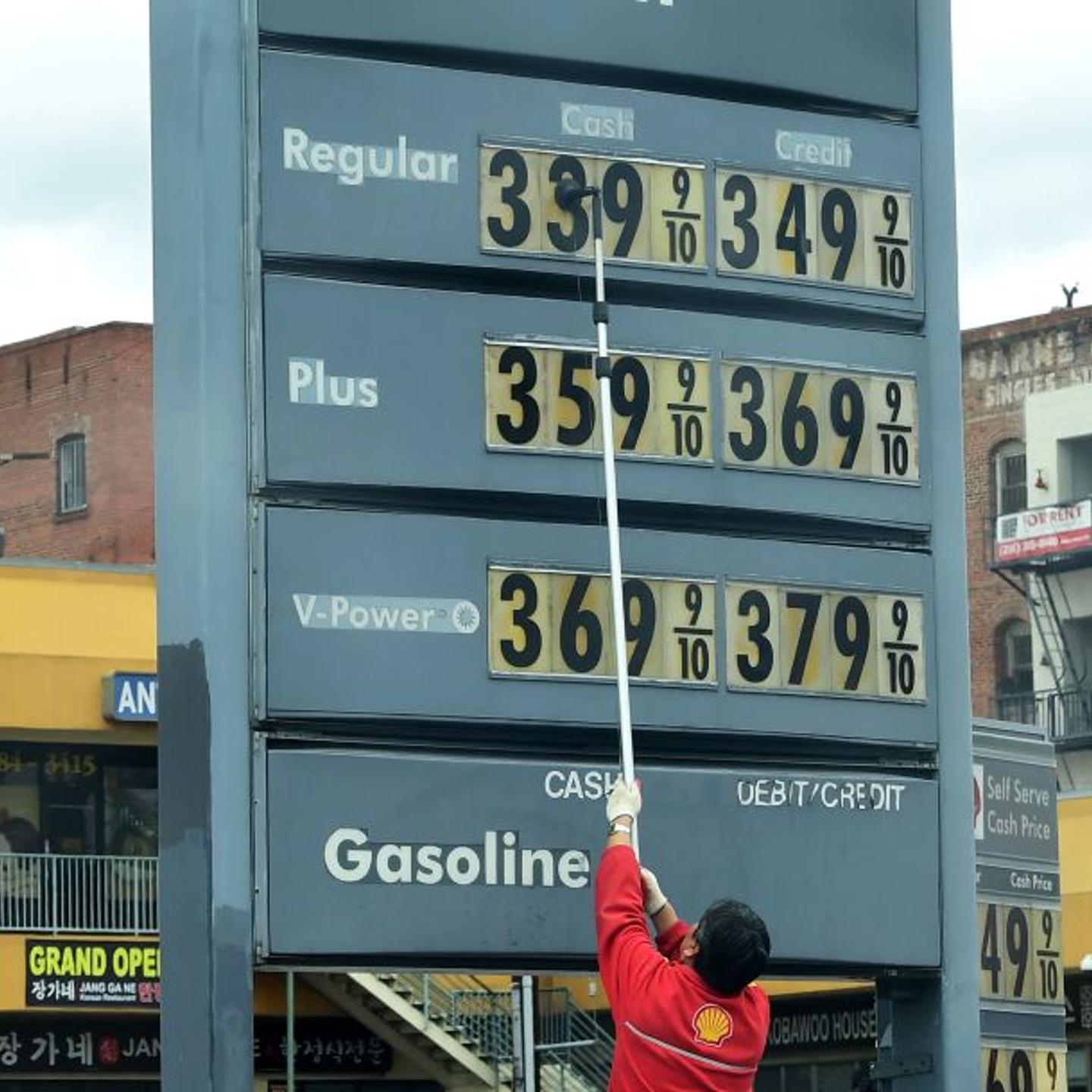 Gas station prices are adjusted as prices fall nationwide due to the coronavirus pandemic in Los Angeles on March 20, 2020