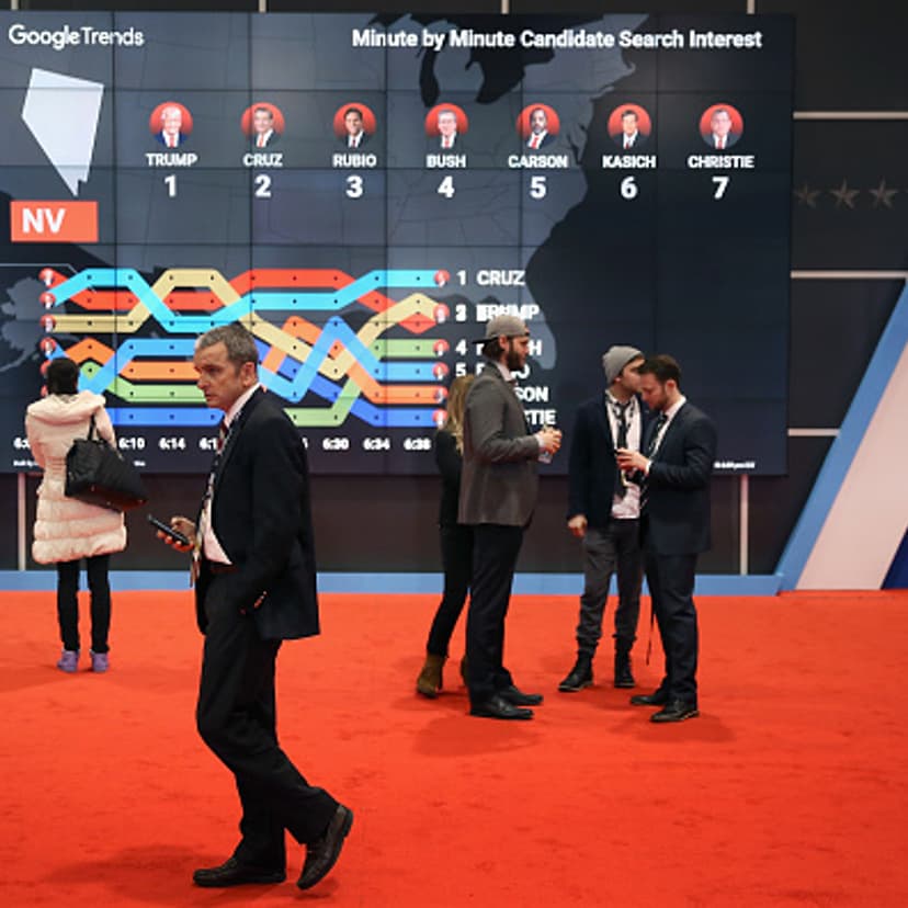 The media filing center for the Republican presidential debate at St. Anselm College includes a large video screen displaying motion graphics about how the candidates are trending on Google February 6, 2016 in Manchester, Iowa.