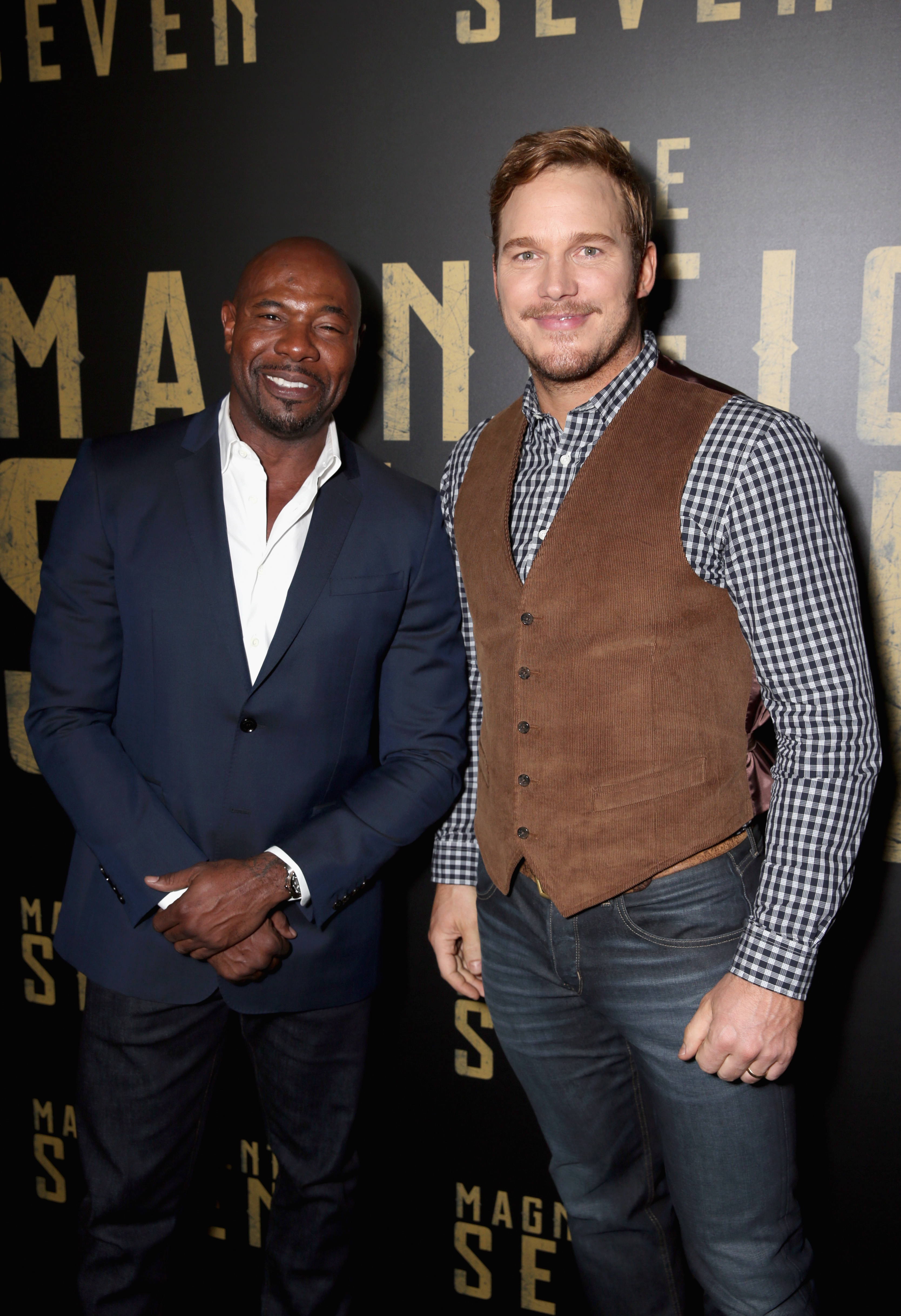 'The Magnificent Seven' director Antoine Fuqua (L) and actor Chris Pratt attend CinemaCon on April 12, 2016 in Las Vegas, Nevada.
