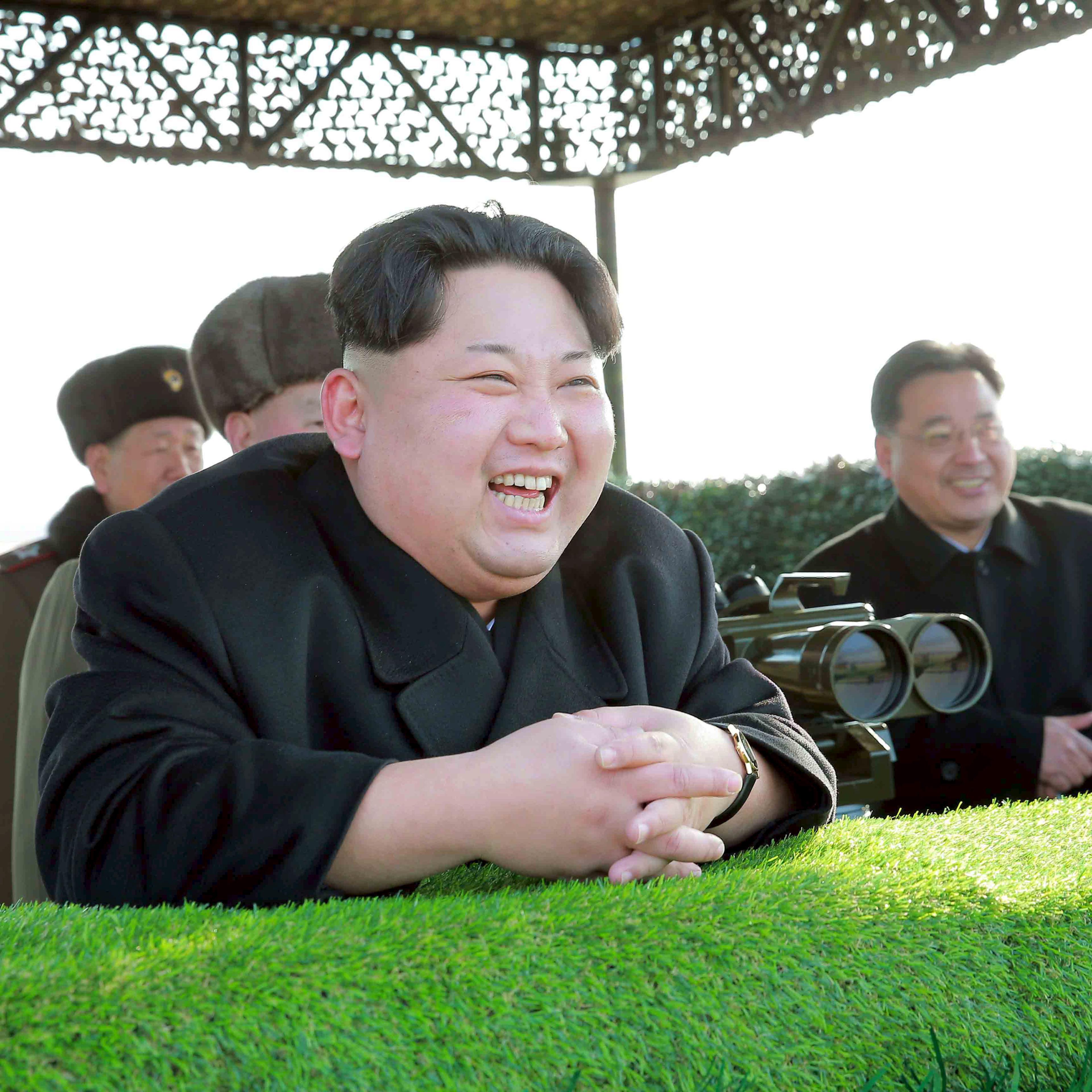 North Korean leader Kim Jong Un reacts during a test-fire of an anti-tank guided weapon in this undated photo released by North Korea's Korean Central News Agency (KCNA) in Pyongyang