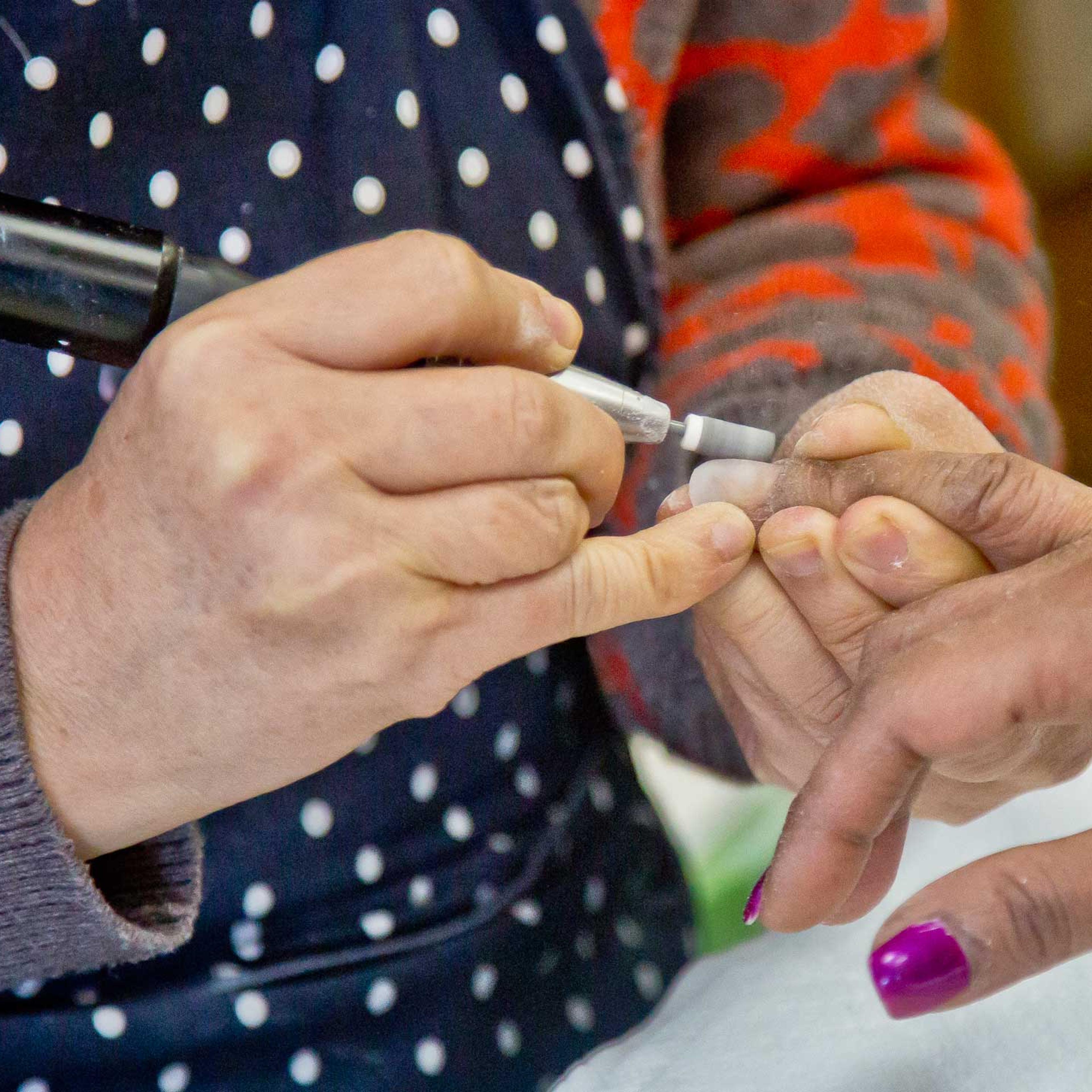 A customer receives a manicure at Castle nail salon in New York City on Jan. 8, 2015.