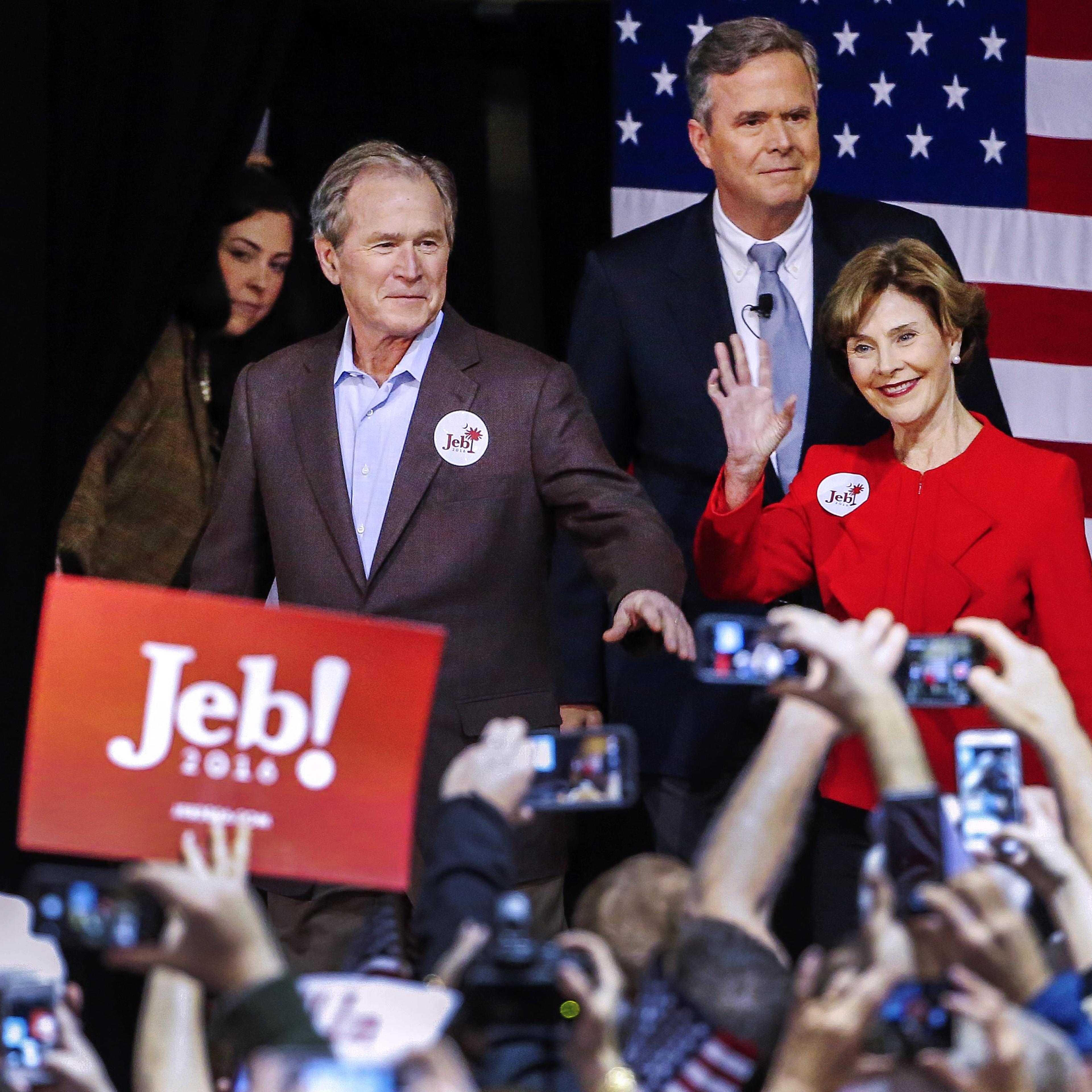 Republican presidential candidate and former Florida Gov. Jeb Bush, center, participates in a campaign event with brother, former President George W. Bush and former First Lady Laura Bush in North Charleston, S.C. on Feb. 15, 2016.