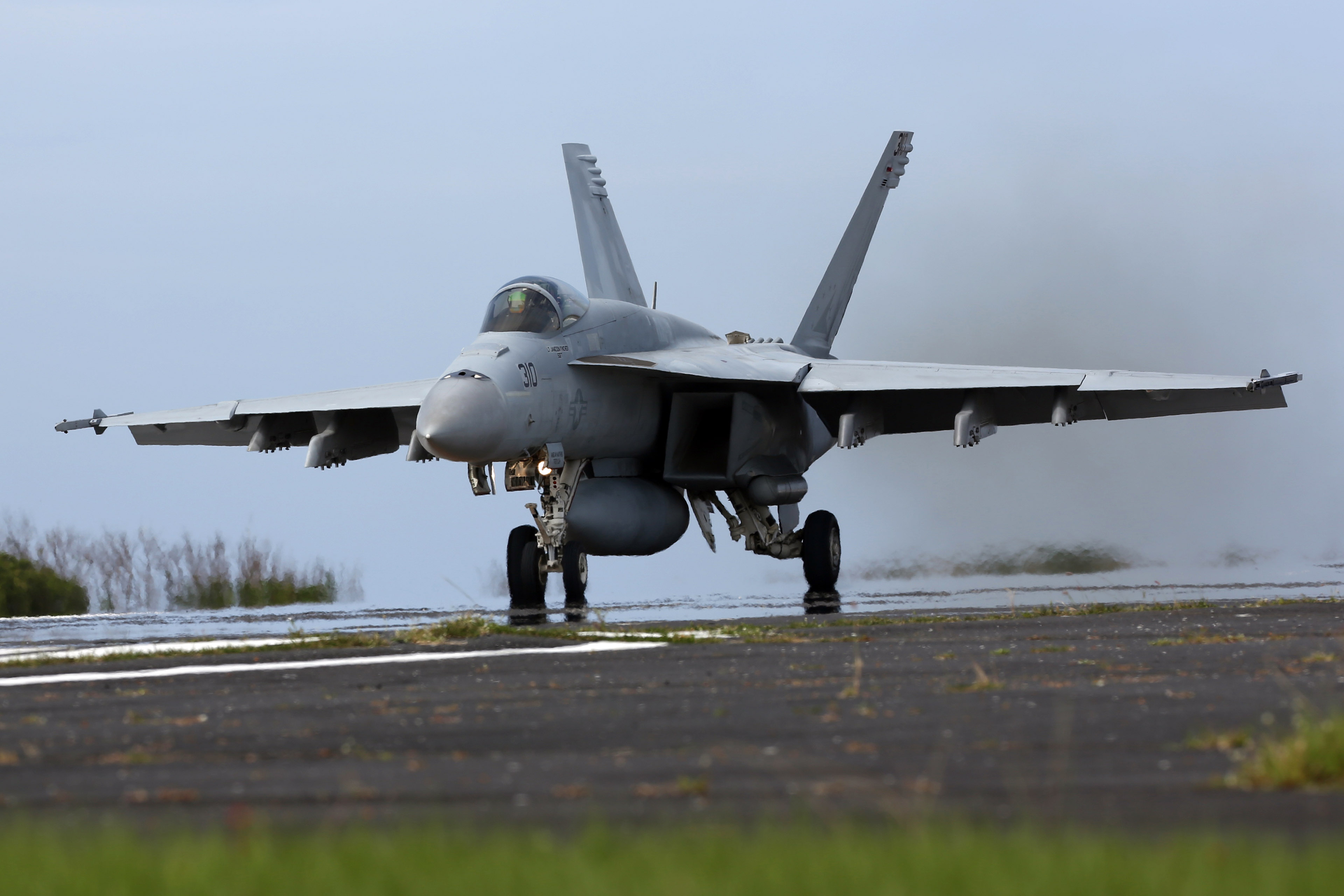 U.S. Navy Conduct Field Carrier Landing Practice In Iwo Jima