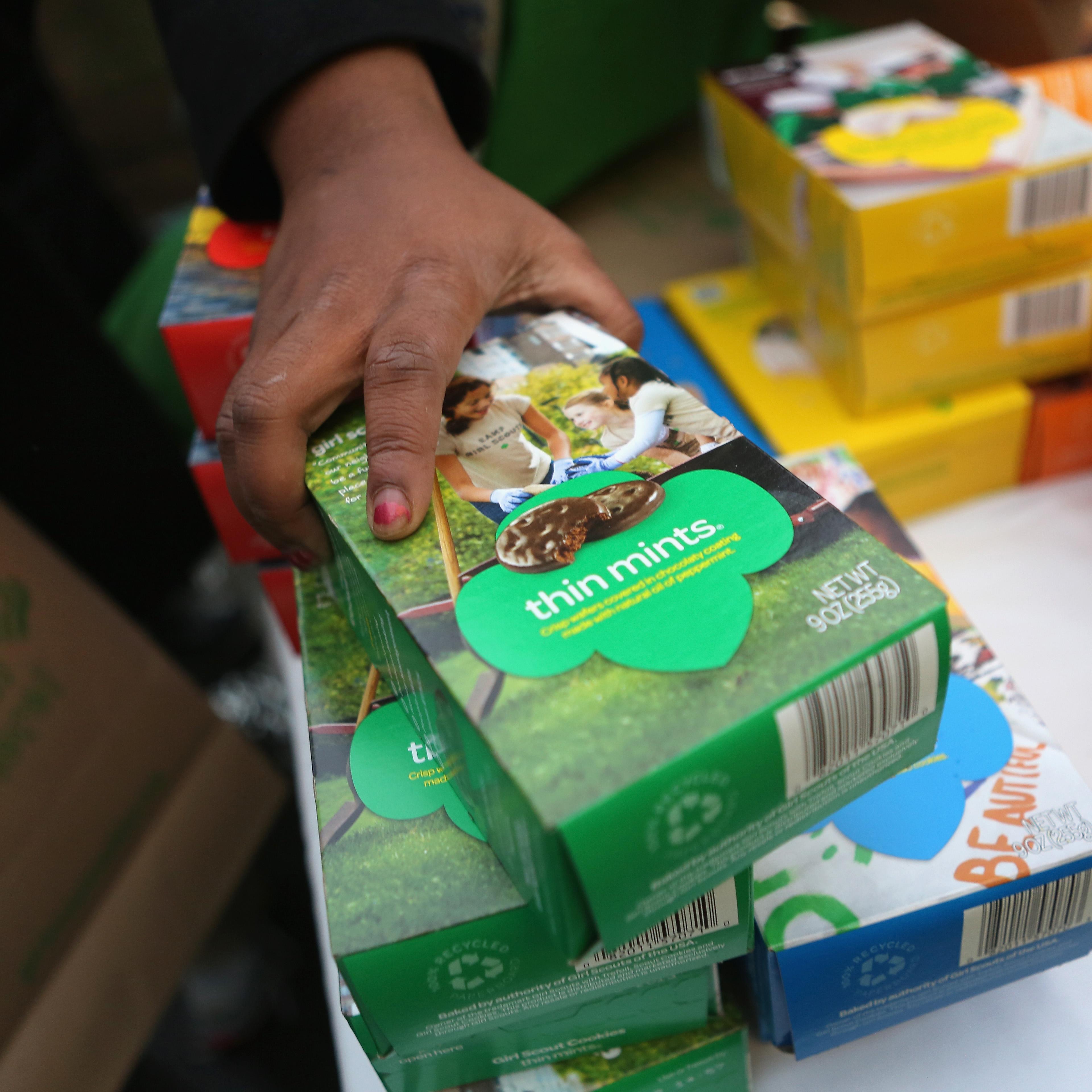 Girl Scouts Sell Cookies From Street Trucks In New York City